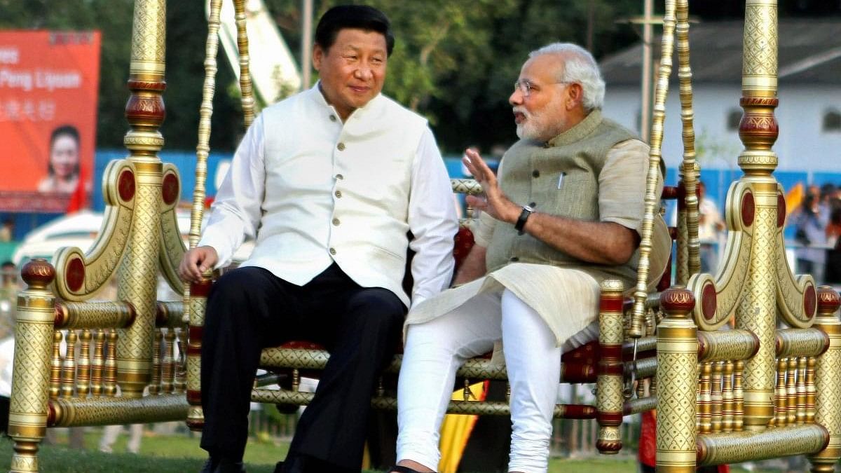 <div class="paragraphs"><p>Prime Minister Narendra Modi (right) and Chinese President Xi Jinping (left).</p></div>