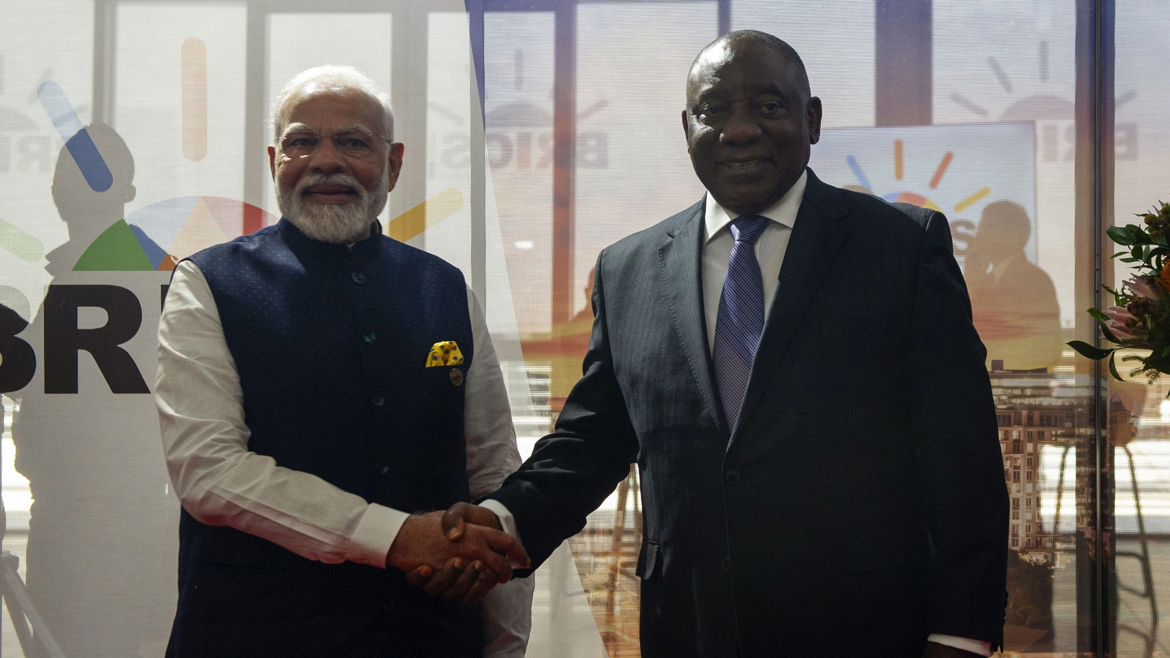 <div class="paragraphs"><p>Prime Minister Narendra Modi with South Africa's President Cyril Ramaphosa at the 2023 BRICS Summit, in Johannesburg.</p></div>