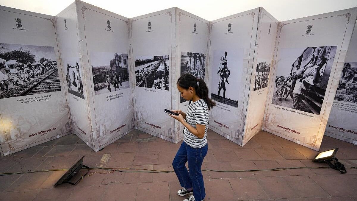 <div class="paragraphs"><p>A visitor at an exhibition on 'Horrors of Partition' organised to observe Partition Horrors Remembrance Day.</p></div>