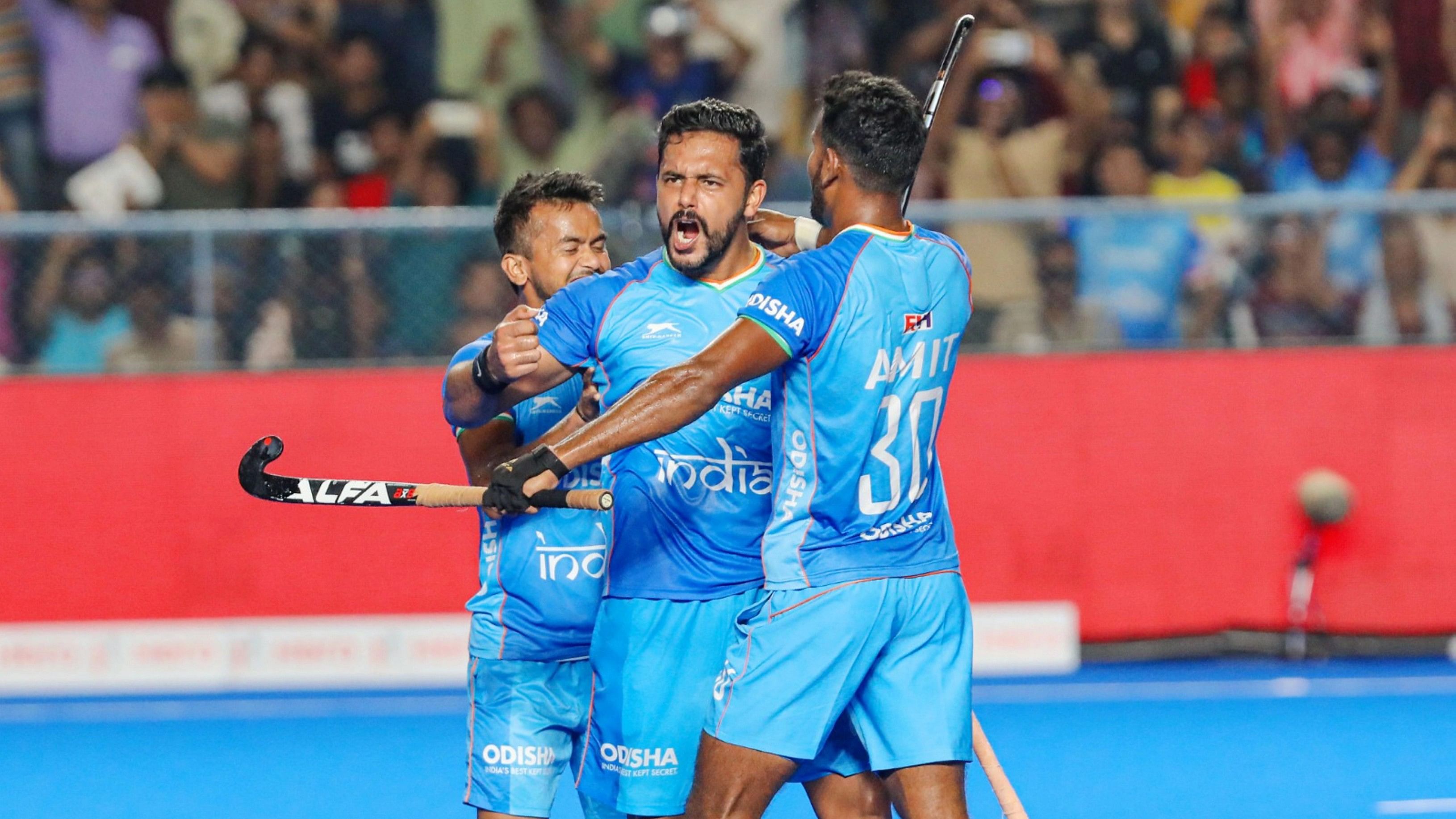 <div class="paragraphs"><p> India's captain Harmanpreet Singh celebrates with teammates after scoring a goal against Pakistan during their Asian Champions Trophy 2023 Hockey match  at Mayor Radhakrishnan Hockey Stadium,  in Chennai, Wednesday, Aug. 9, 2023. </p></div>