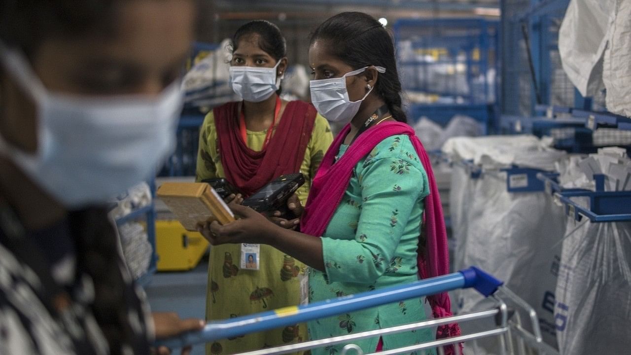 <div class="paragraphs"><p>Representative image of women working at a factory</p></div>