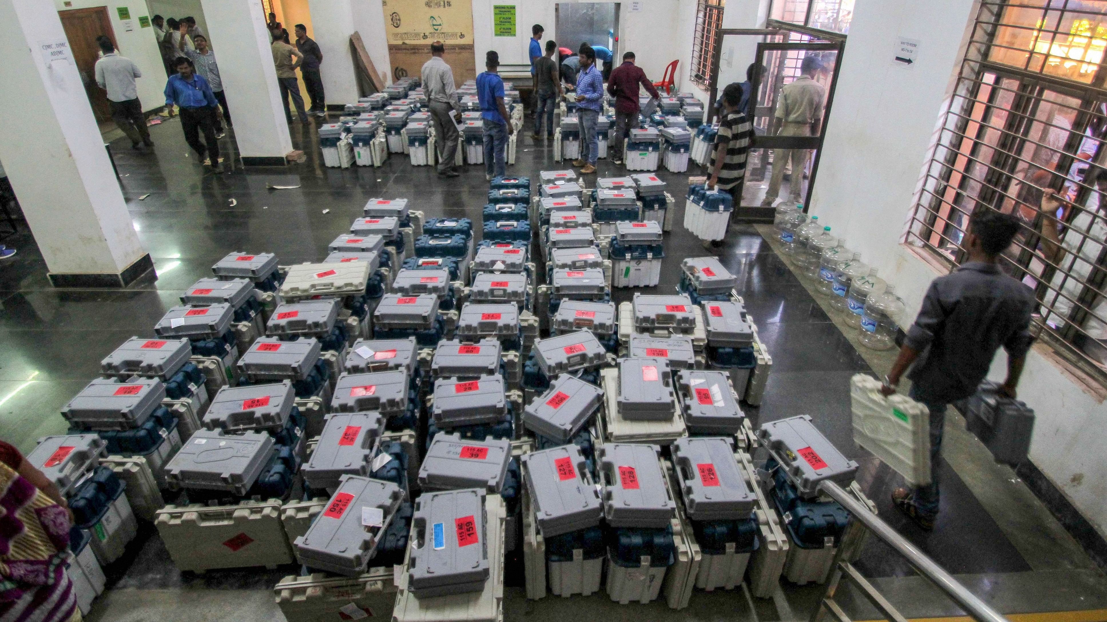 <div class="paragraphs"><p>Representative image of ECI staff inspecting ballot boxes.</p></div>