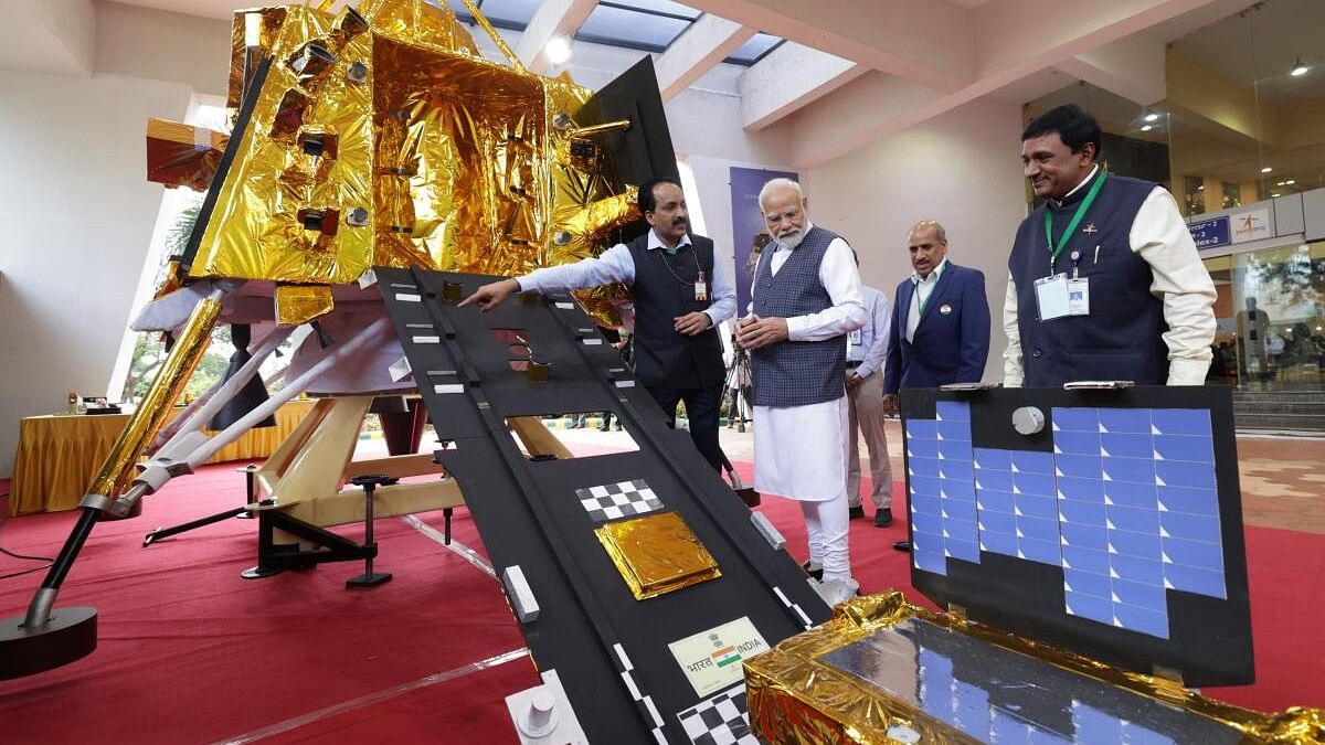 <div class="paragraphs"><p>File photo of PM Modi with the scientists of ISRO on the success of Chandrayaan-3 Mission in Bengaluru.&nbsp;</p></div>