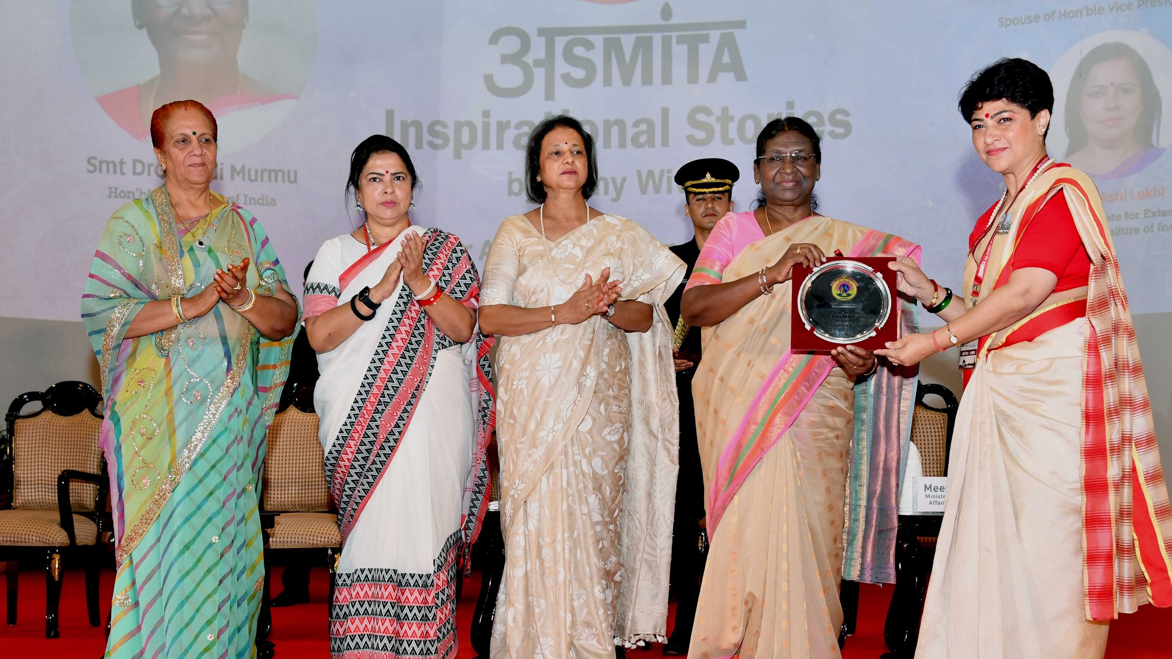 <div class="paragraphs"><p>President Droupadi Murmu graced 'ASMITA-Inspirational Stories by Army Wives', organised by the Army Wives Association (AWWA), in New Delhi.</p></div>