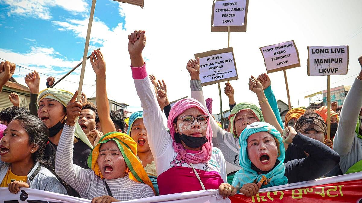 <div class="paragraphs"><p>Volunteers with displaced villagers from Gwaltabi protest over the ongoing ethnic violence in Manipur, at Yaingangpokpi in Imphal East, Wednesday, Aug 16, 2023.</p></div>