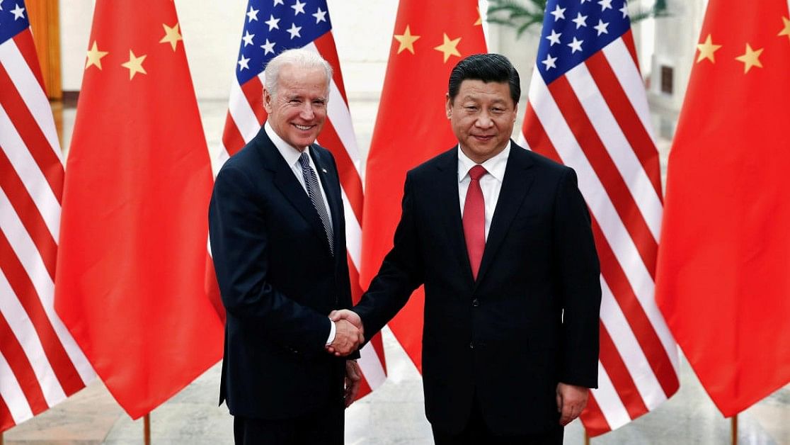 <div class="paragraphs"><p>US President-elect Joe Biden and China's XI Jinping. </p></div>