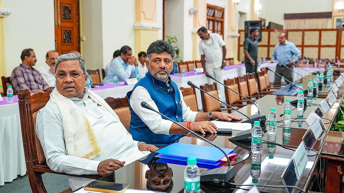 <div class="paragraphs"><p>Karnataka CM Siddaramaiah with his deputy D K Shivakumar during the all-party meeting to discuss the issue of releasing Cauvery river water to neighbouring Tamil Nadu, at Vidhana Soudha in Bengaluru.&nbsp;</p></div>