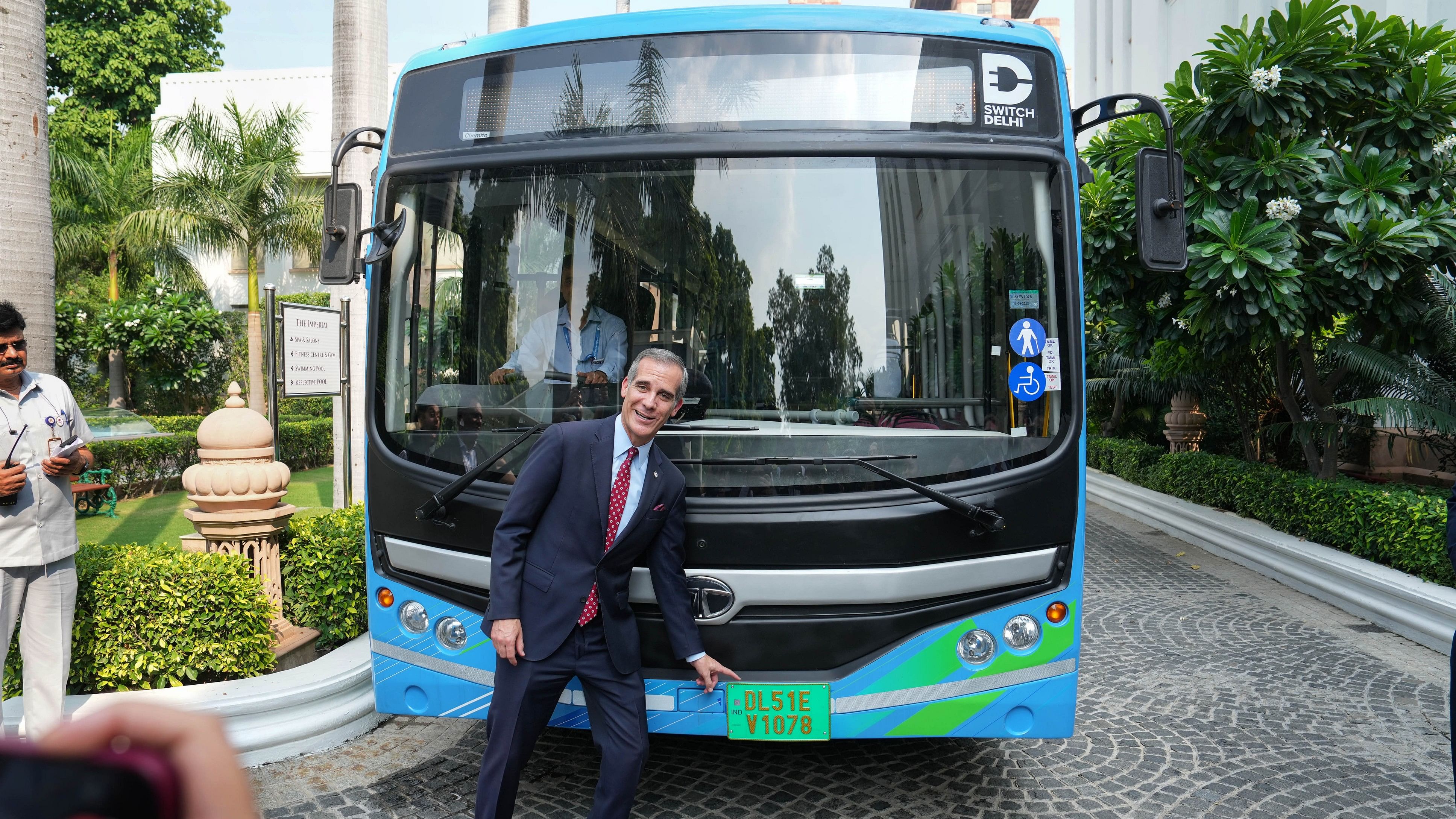 <div class="paragraphs"><p>United States Ambassador to India Eric Garcetti poses for photos after traveling in an e-bus during the launch of a mechanism to facilitate deployment of 10,000 electric buses in cities across India as part of a US-India partnership, in New Delhi.</p></div>