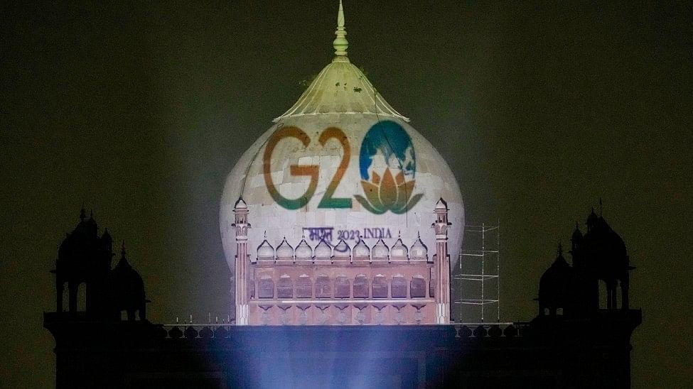 <div class="paragraphs"><p>The Safdarjung Tomb is illuminated with the logo of G20 Summit 2023 in New Delhi. </p></div>