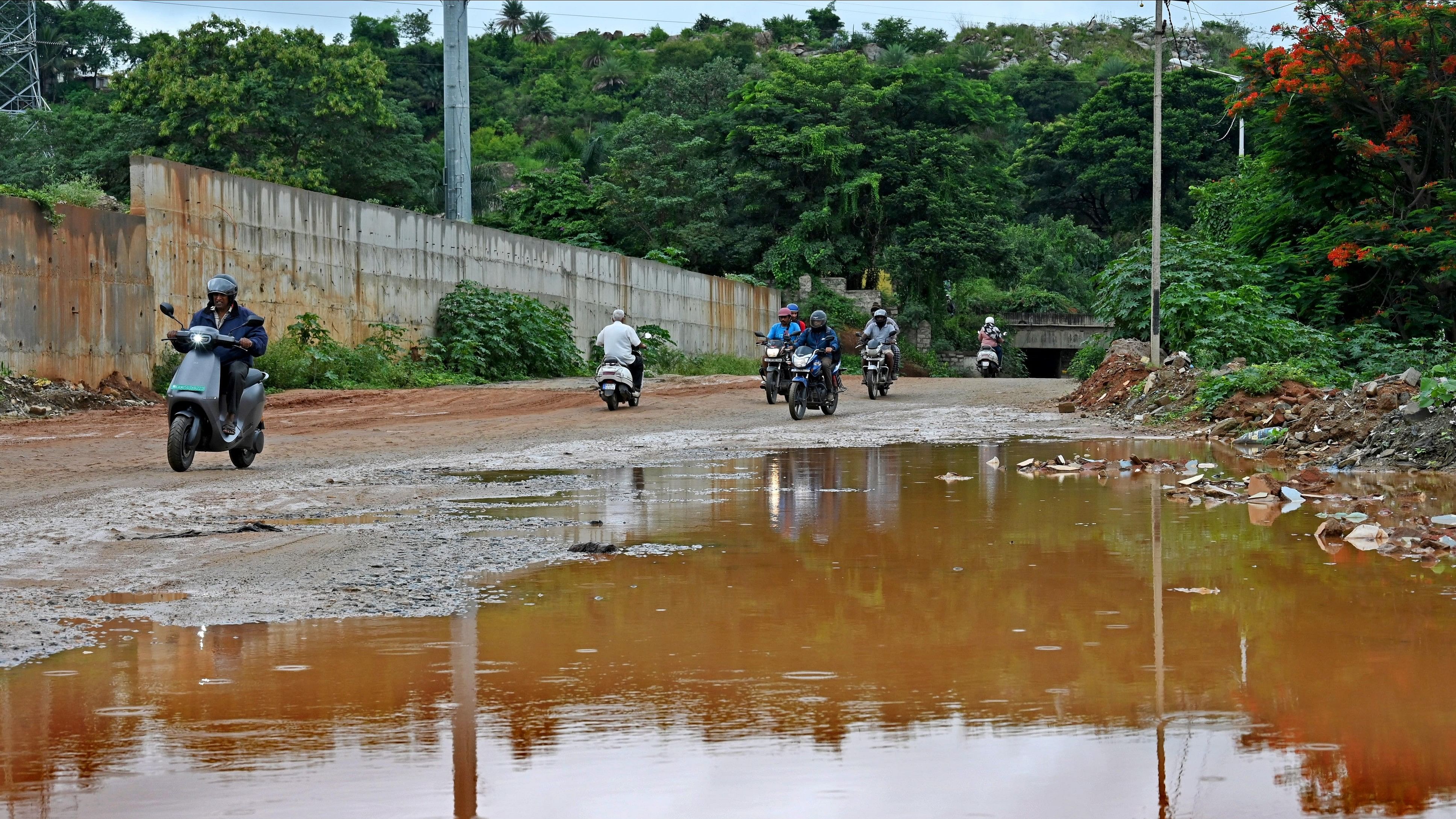 <div class="paragraphs"><p>Kerekodi Road, adjoining Hosakerehalli Lake, has been in a pathetic condition ever since the BBMP abandoned the work almost three months ago. Earlier, it used to be lined with trees but is now filled with dust. </p></div>