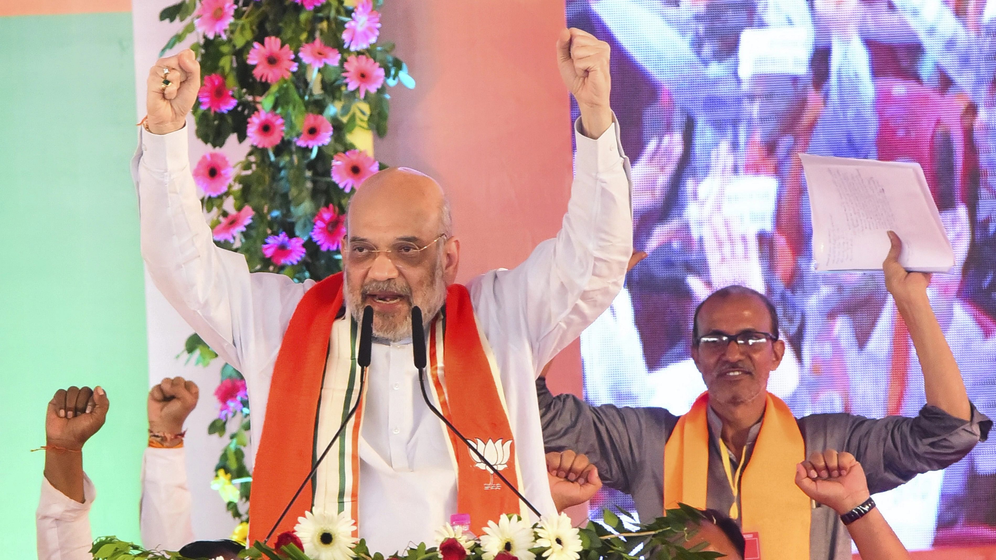 <div class="paragraphs"><p>Union Home Minister Amit Shah addresses supporters during the launch of BJP's 'Jan Ashirwad Yatra', in Mandla district, Tuesday, Sept. 5, 2023. </p></div>