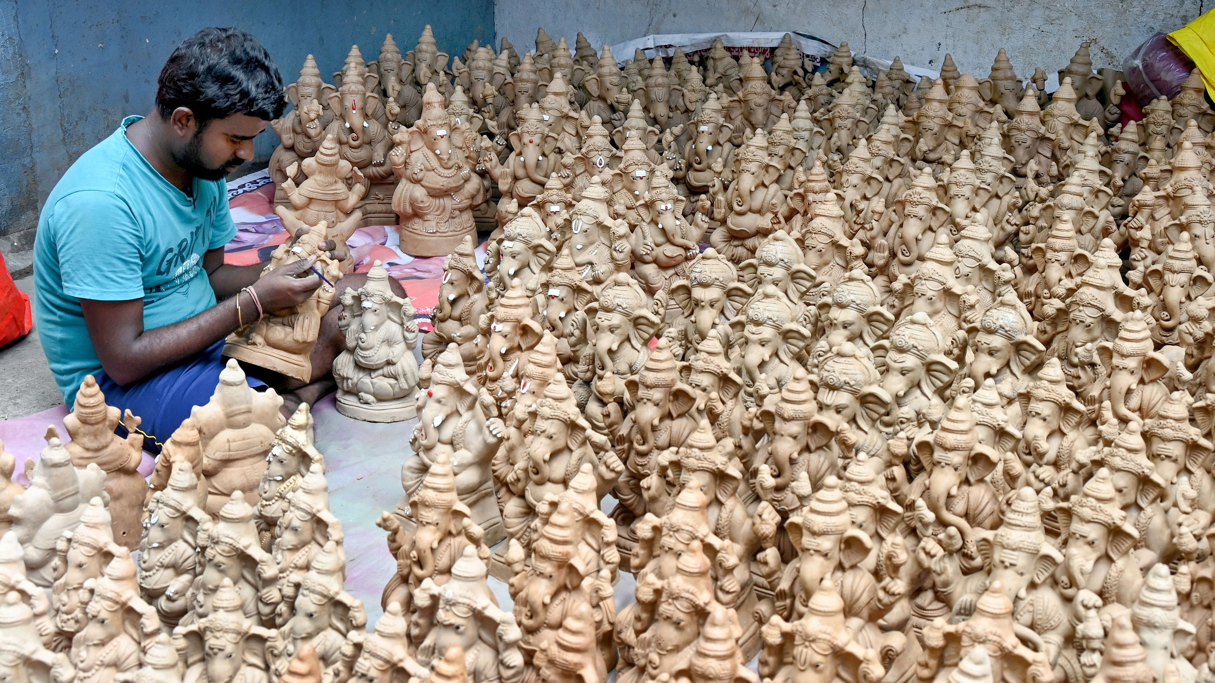 <div class="paragraphs"><p>An artisan adds finishing touches to eco-friendly clay idols for Gowri-Ganesha festival.&nbsp;&nbsp;</p></div>
