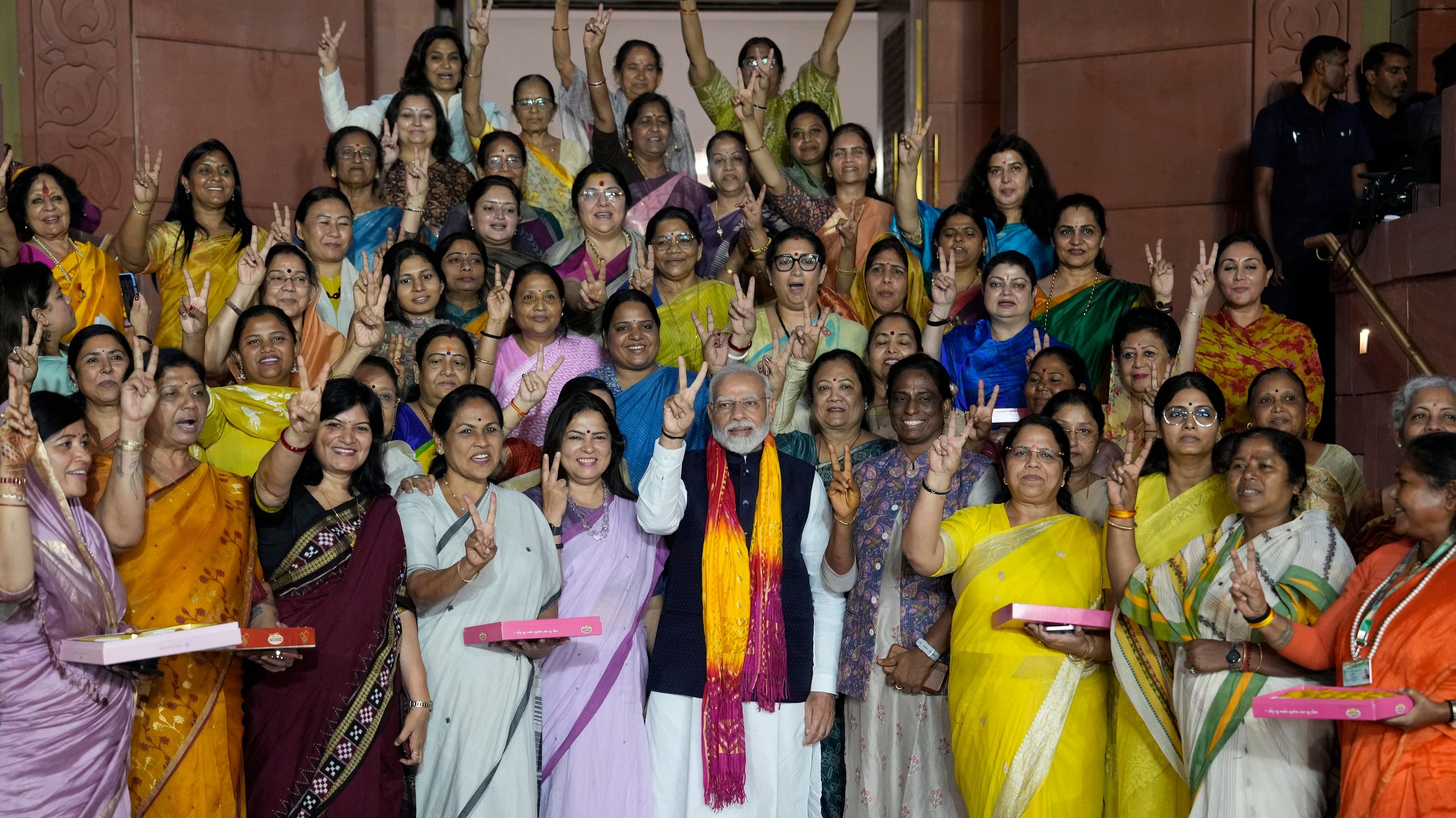 <div class="paragraphs"><p>Women MPs celebrate with PM Modi&nbsp;after Women's Reservation Bill passes in Rajya Sabha.</p></div>