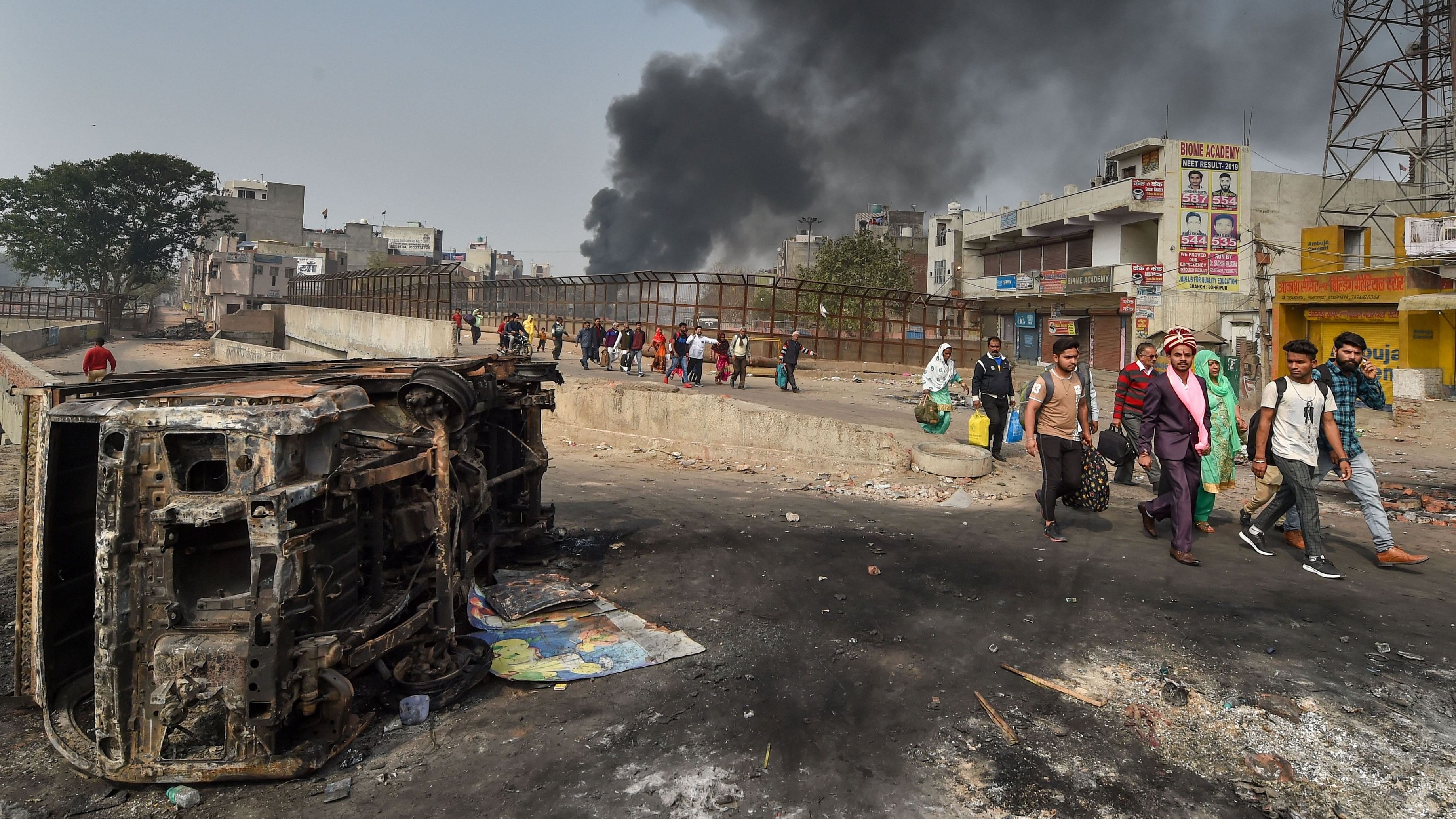 <div class="paragraphs"><p>A bridegroom along with relatives heads for his wedding as they walk past Bhagirathi Vihar area of the riot-affected north east Delhi, Wednesday, Feb. 26, 2020.</p></div>