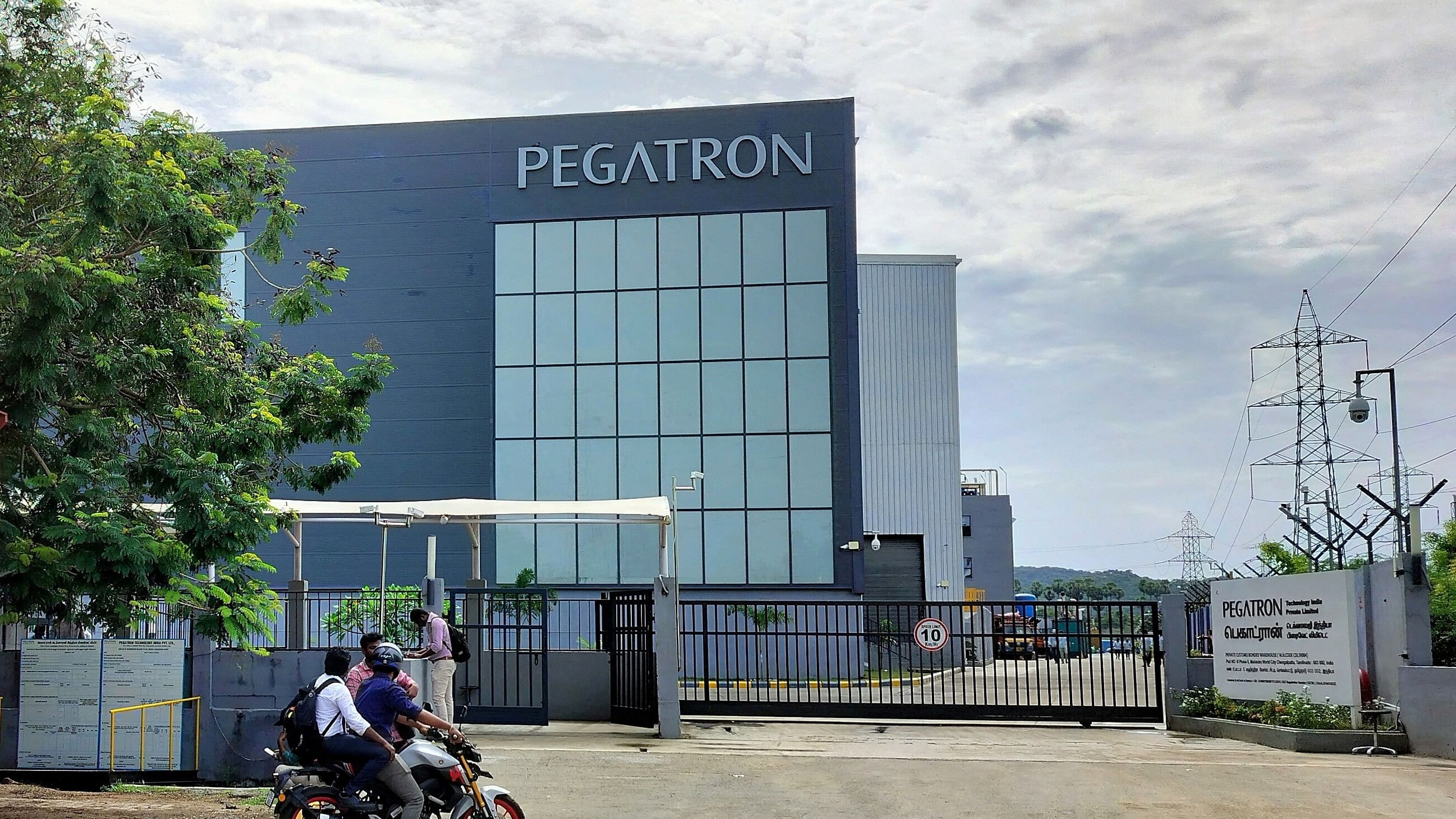 <div class="paragraphs"><p>FILE PHOTO: People are seen outside the main gate of the Pegatron facility following a fire incident at the facility.</p></div>