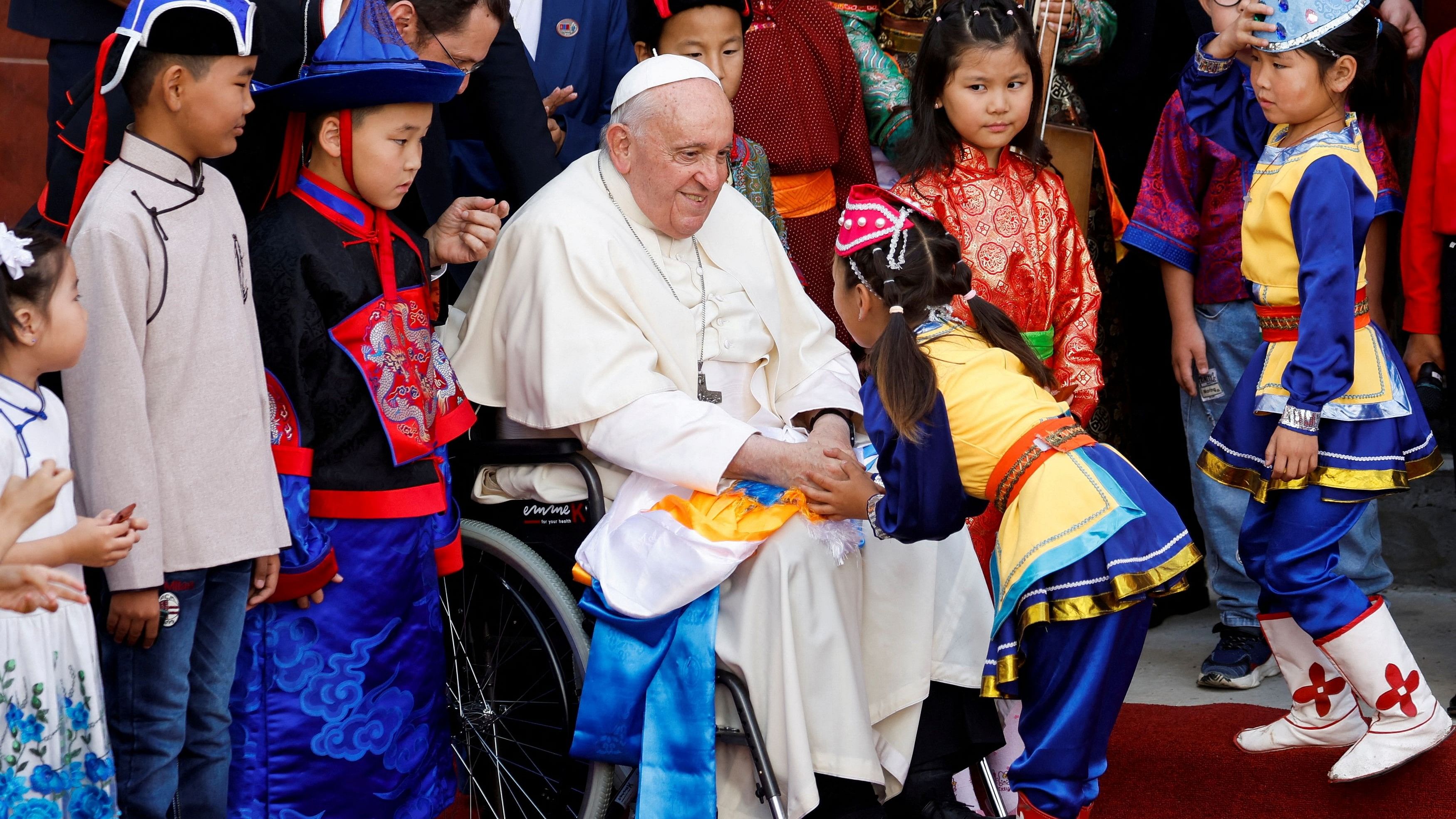 <div class="paragraphs"><p>Pope Francis greets a child during a welcome ceremony at the bishop's house during his Apostolic Journey, in Ulaanbaatar, Mongolia.</p></div>