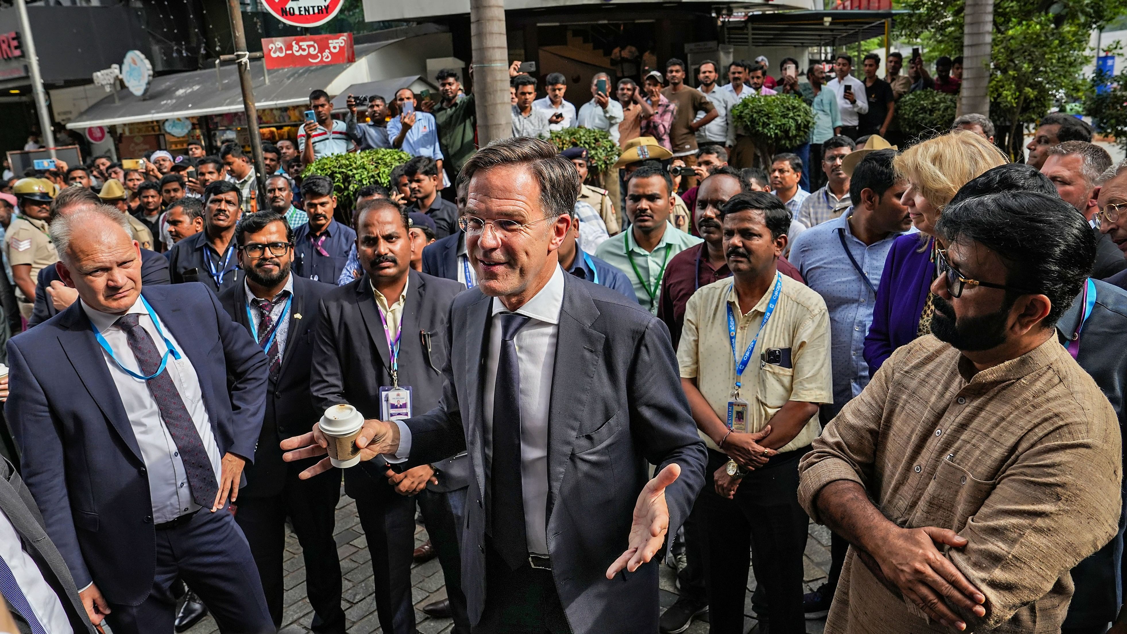 <div class="paragraphs"><p>People on Church Street listen with rapt attention to Prime Minister of Netherlands Mark Rutte. Shantinagar MLA NA Haris looks on. </p></div>