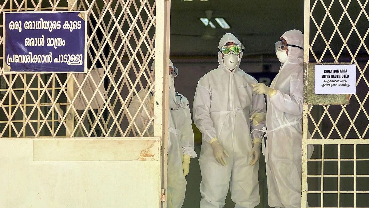 <div class="paragraphs"><p>Health officials at an isolation ward of Ernakulam Medical College in Kochi.</p></div>