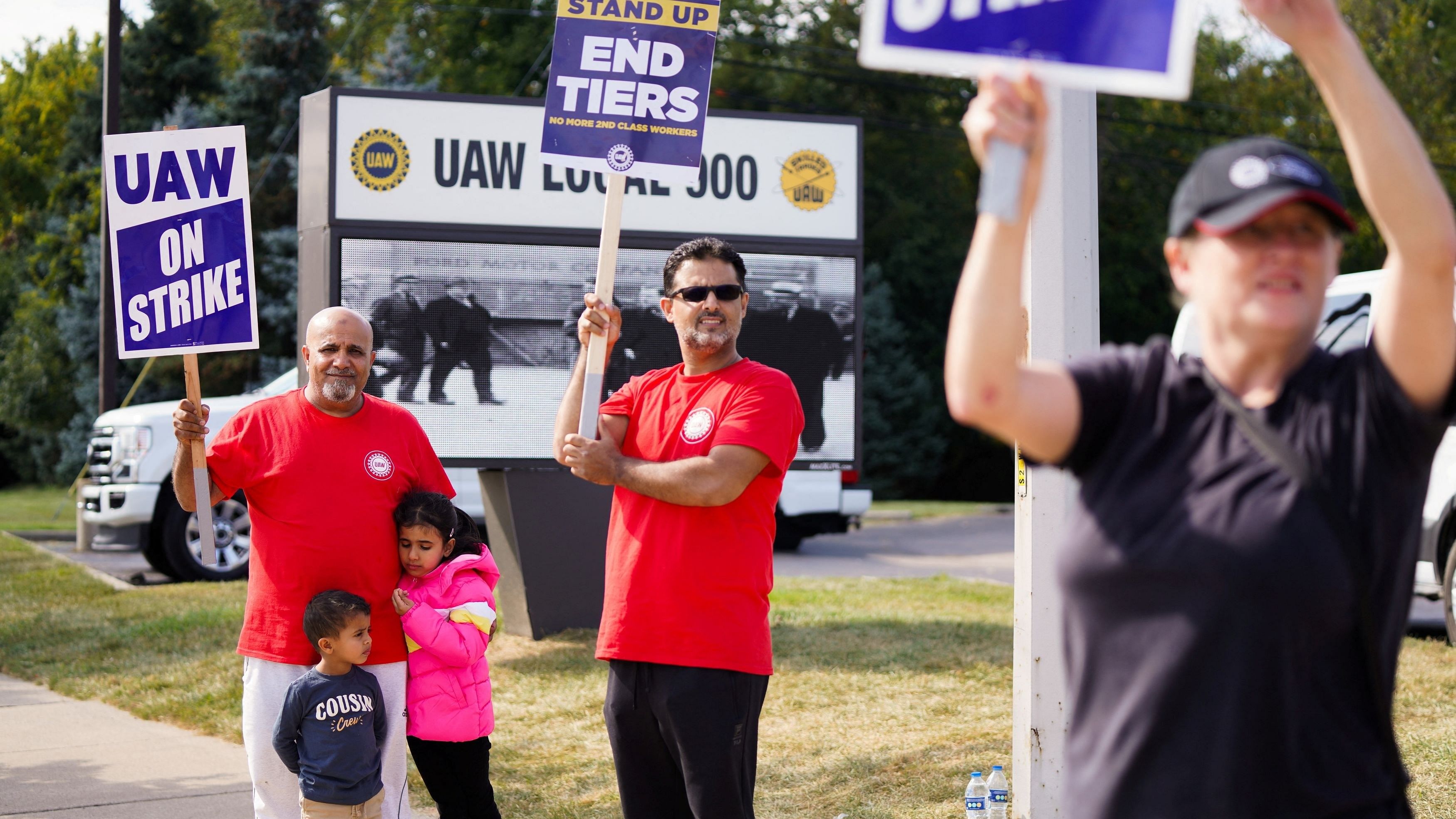 <div class="paragraphs"><p>Striking United Auto Workers  union workers picket outside the Ford Michigan Assembly Plant in  US.</p></div>