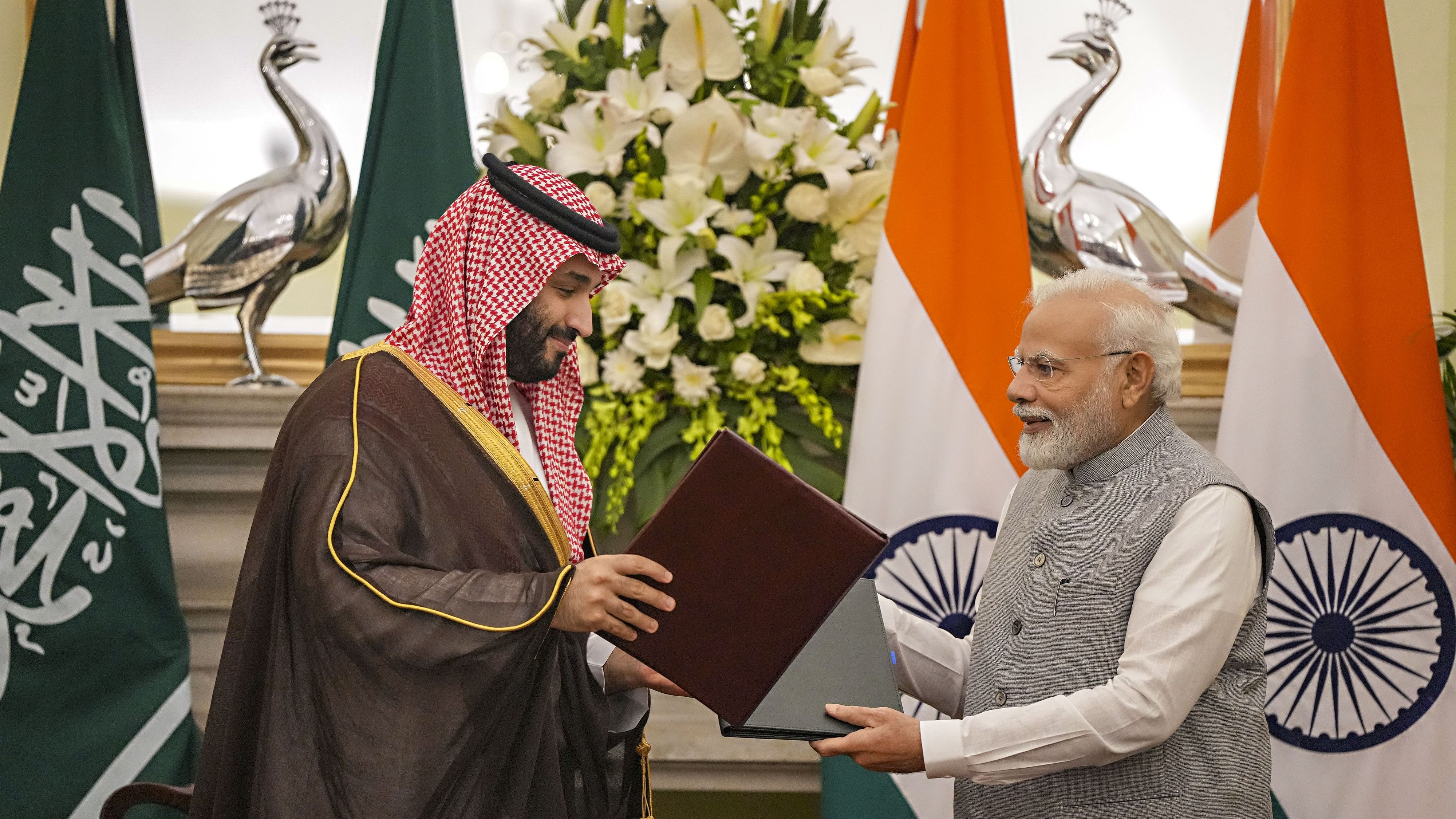 <div class="paragraphs"><p>Prime Minister Narendra Modi and Saudi Arabia's Crown Prince and Prime Minister Mohammed bin Salman bin Abdulaziz Al Saud during signing of minutes of the first meeting of India-Saudi Arabia Strategic Partnership Council at the Hyderabad House, in New Delhi.</p></div>