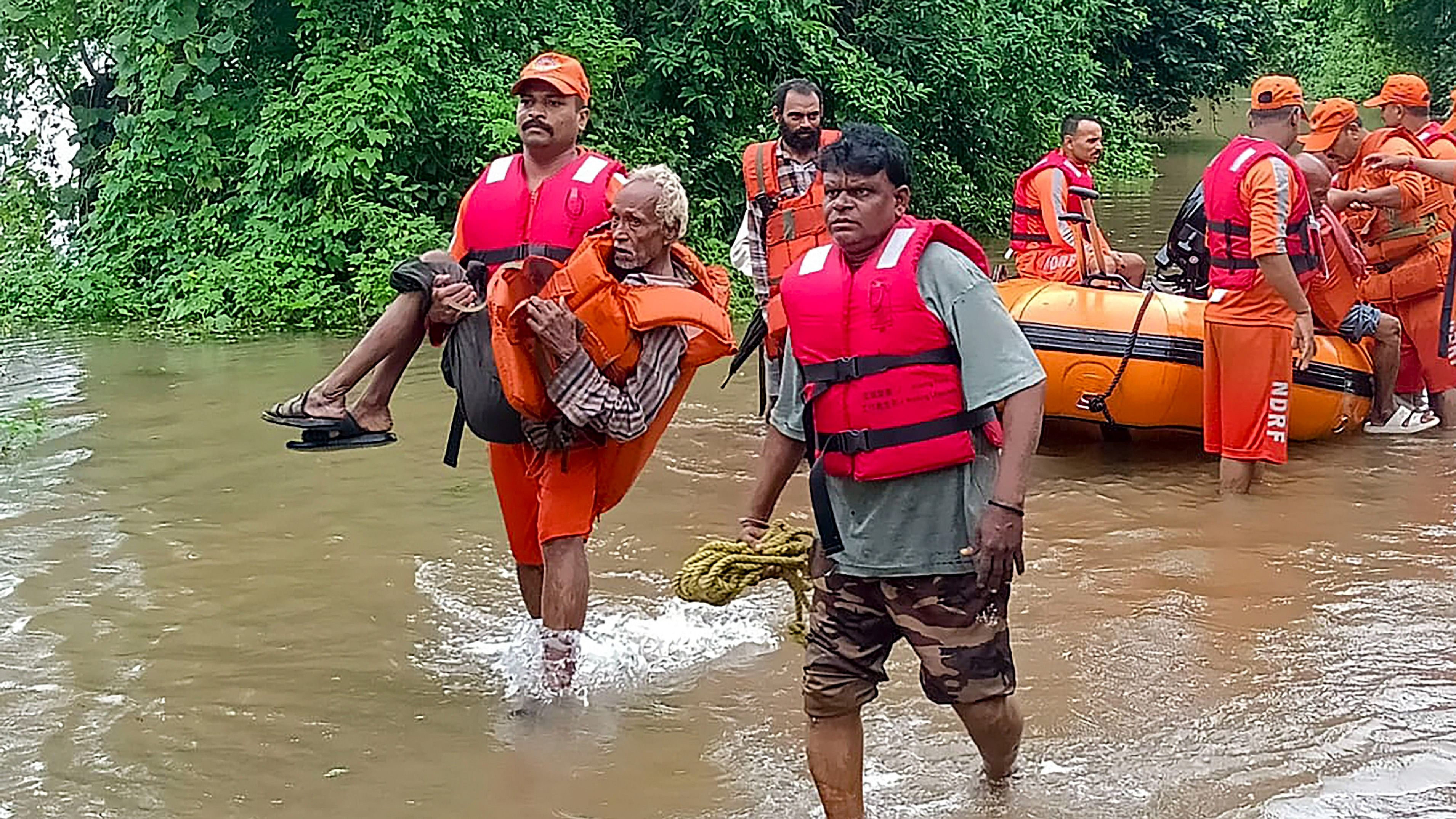 <div class="paragraphs"><p>NDRF personnel rescue residents from a flooded area after heavy rains, in Narmada district, Tuesday, Sept. 17, 2023.</p></div>