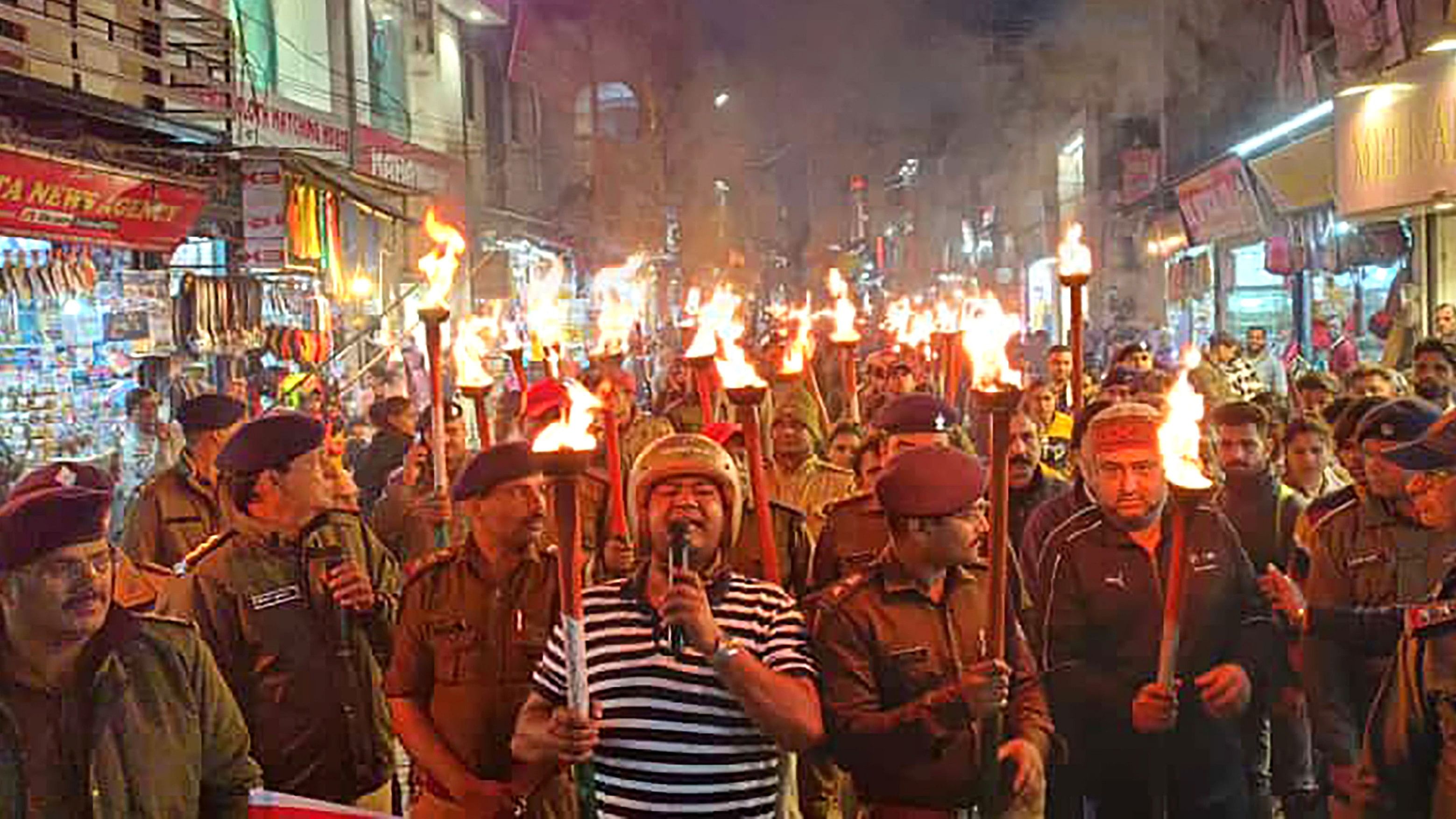 <div class="paragraphs"><p>A group of road safety activists, led by 'Helmet Man' Raghvendra Kumar, stage a protest during the MotoGP event, in Greater Noida.</p></div>