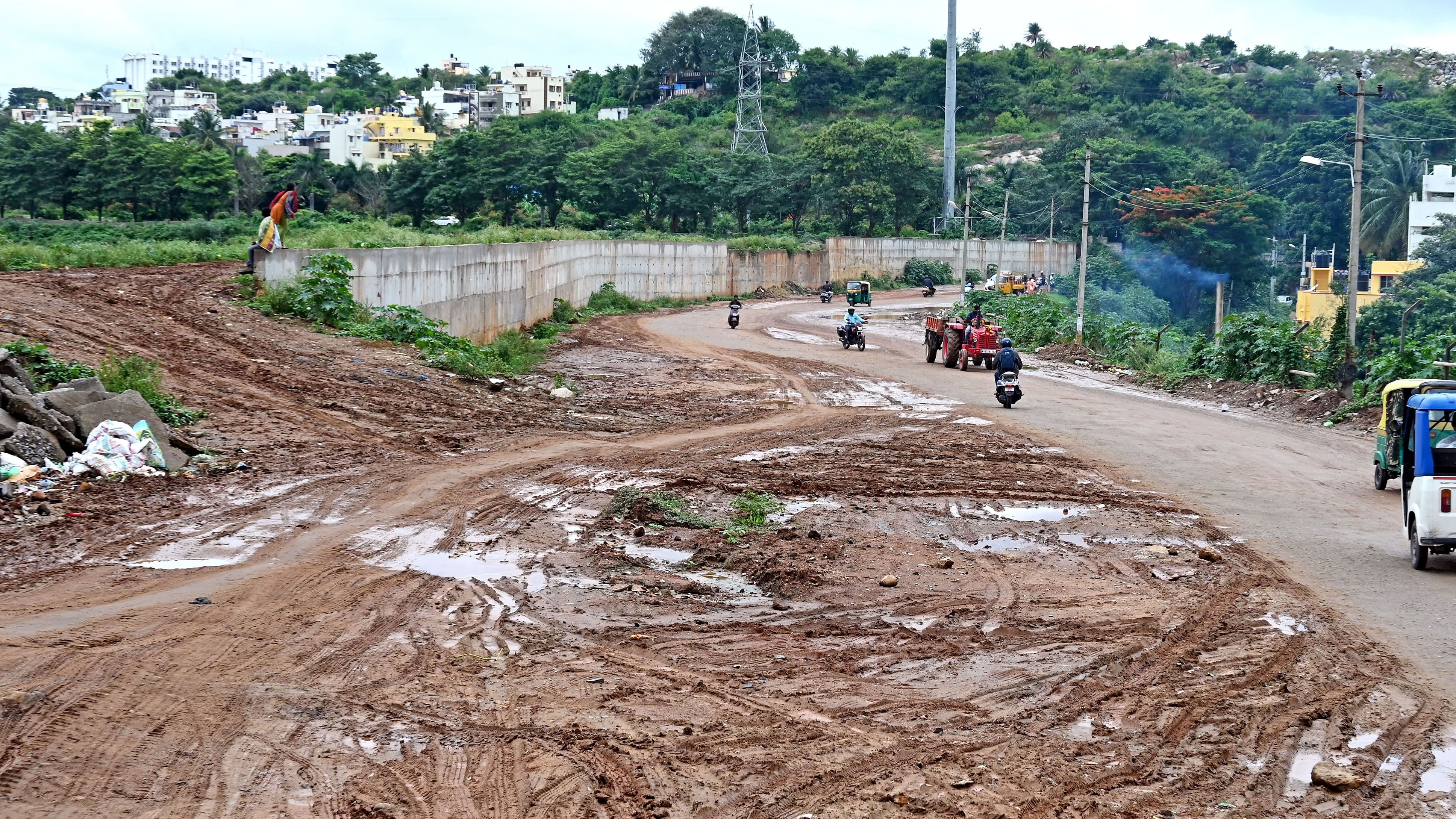 <div class="paragraphs"><p>The deplorable condition of the road next to Hosakerehalli lake.&nbsp;The BBMP, which built a retaining wall on one side of the lake, has not done anything to fix Kerekodi main road, which is buried in dust with the asphalted portion barely visible. </p></div>