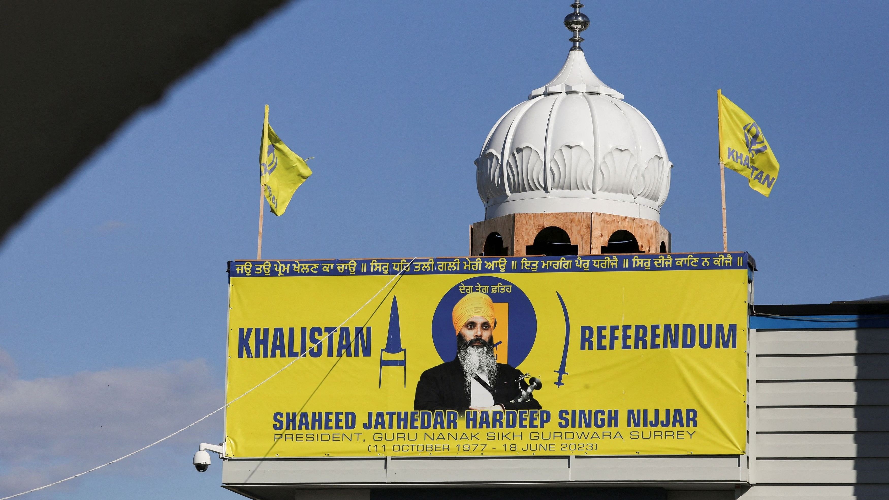 <div class="paragraphs"><p>A banner with the image of Sikh leader Hardeep Singh Nijjar is seen at the Guru Nanak Sikh Gurdwara temple, site of his June 2023 killing, in Surrey, British Columbia, Canada September 20, 2023. </p></div>