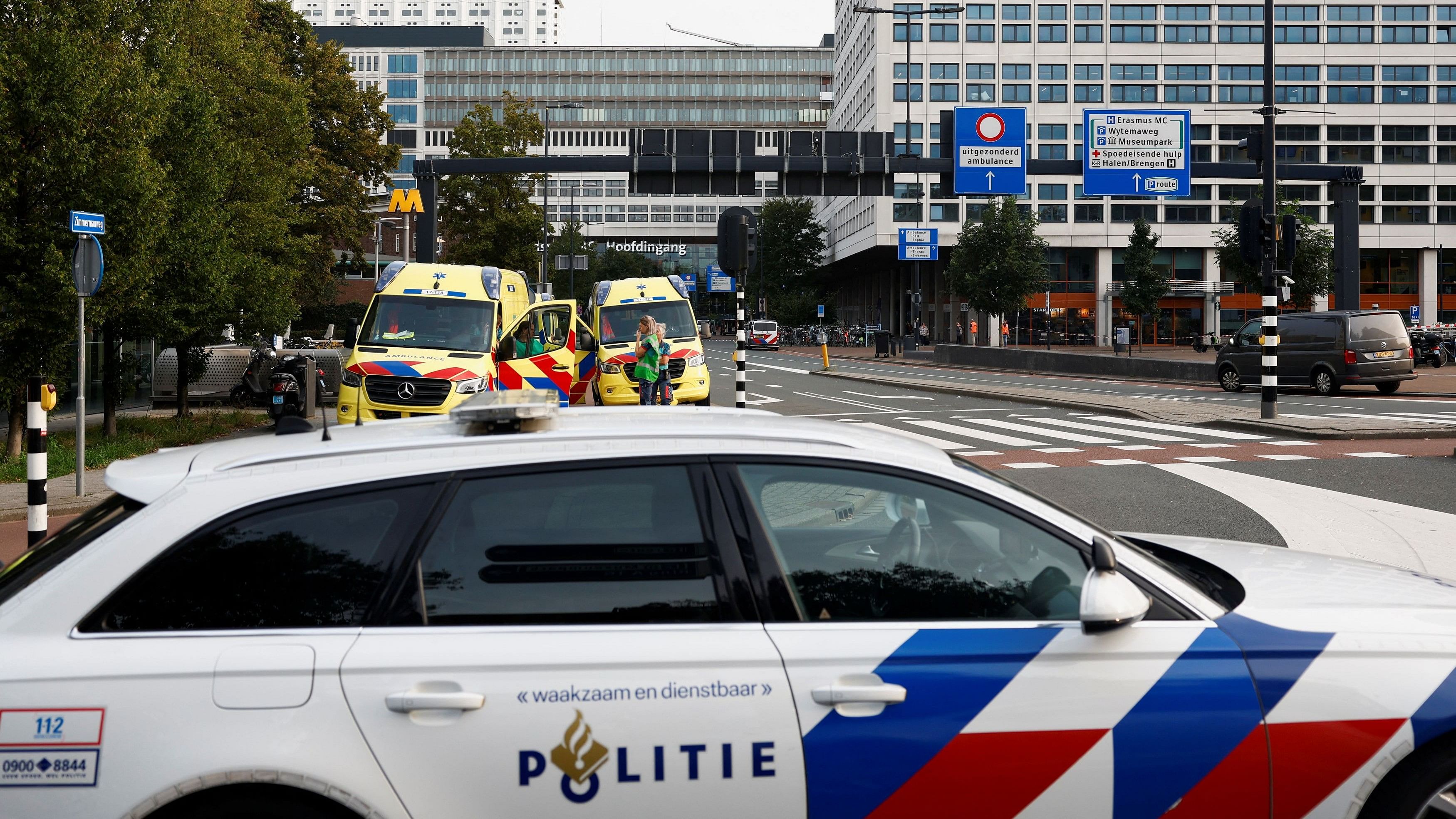 <div class="paragraphs"><p>Members of emergency services work at the area, near a medical center, after Dutch police arrested a suspect after a shooting in Rotterdam, Netherlands.</p></div>