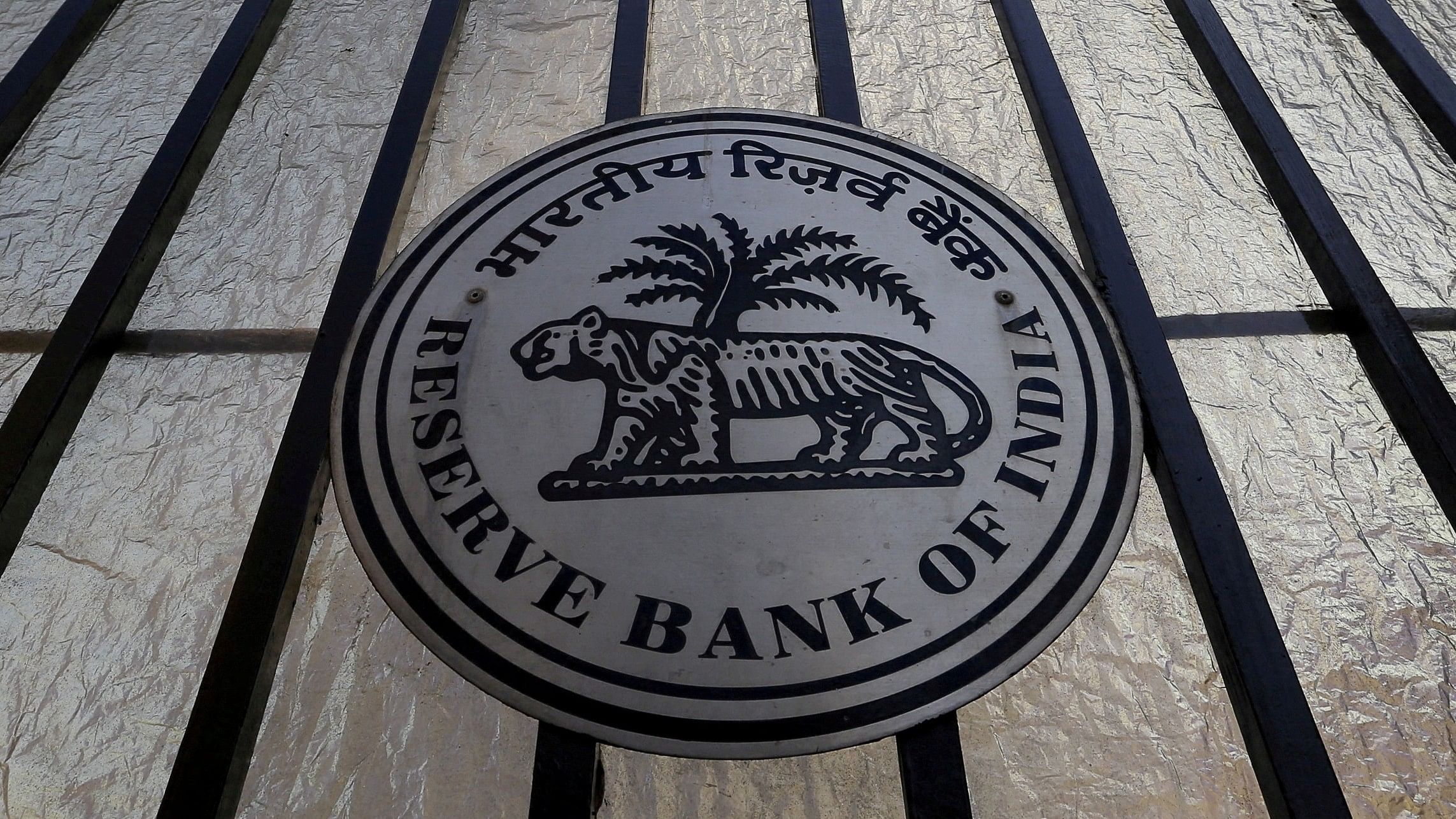 <div class="paragraphs"><p>The Reserve Bank of India  seal is pictured on a gate outside the RBI headquarters in Mumbai.</p></div>