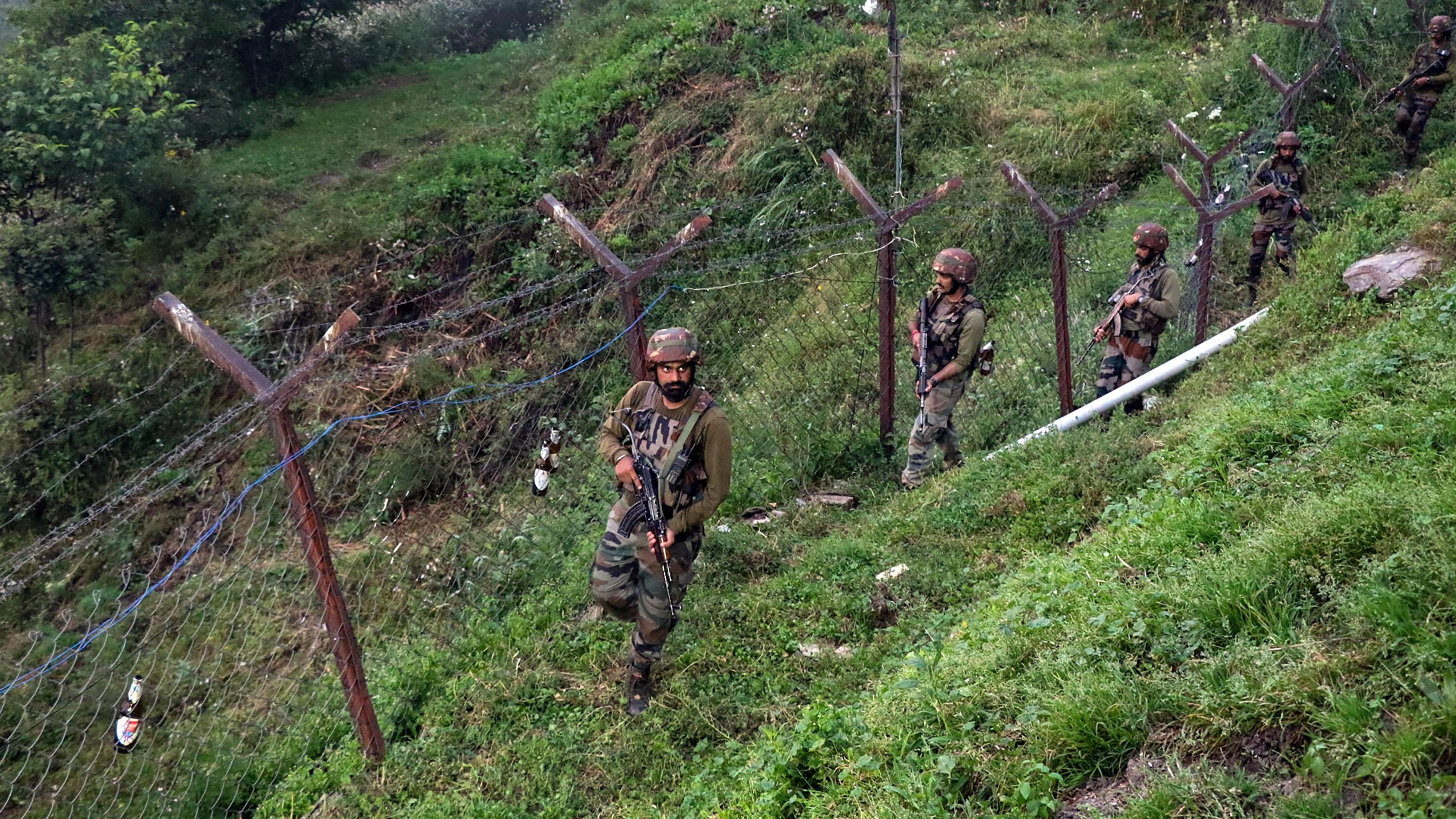 <div class="paragraphs"><p>Army soldiers patrol near the Line of Control (LoC) in Poonch.</p></div>