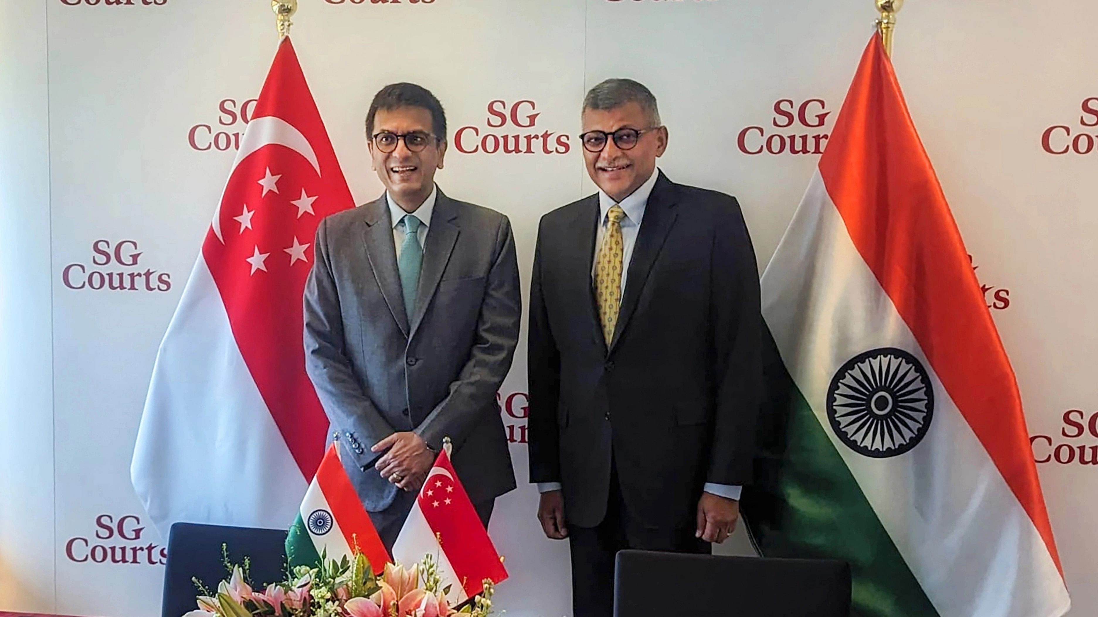 <div class="paragraphs"><p>Chief Justice of India DY Chandrachud with Chief Justice of Singapore Sundaresh Menon during the signing of an MoU between the Supreme Court of India and Supreme Court of Singapore in the field of Judicial Cooperation, Singapore.</p></div>