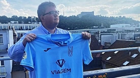 <div class="paragraphs"><p>Martin Podhajský holding the&nbsp;FK Ústí nad Labem club jersey.</p></div>