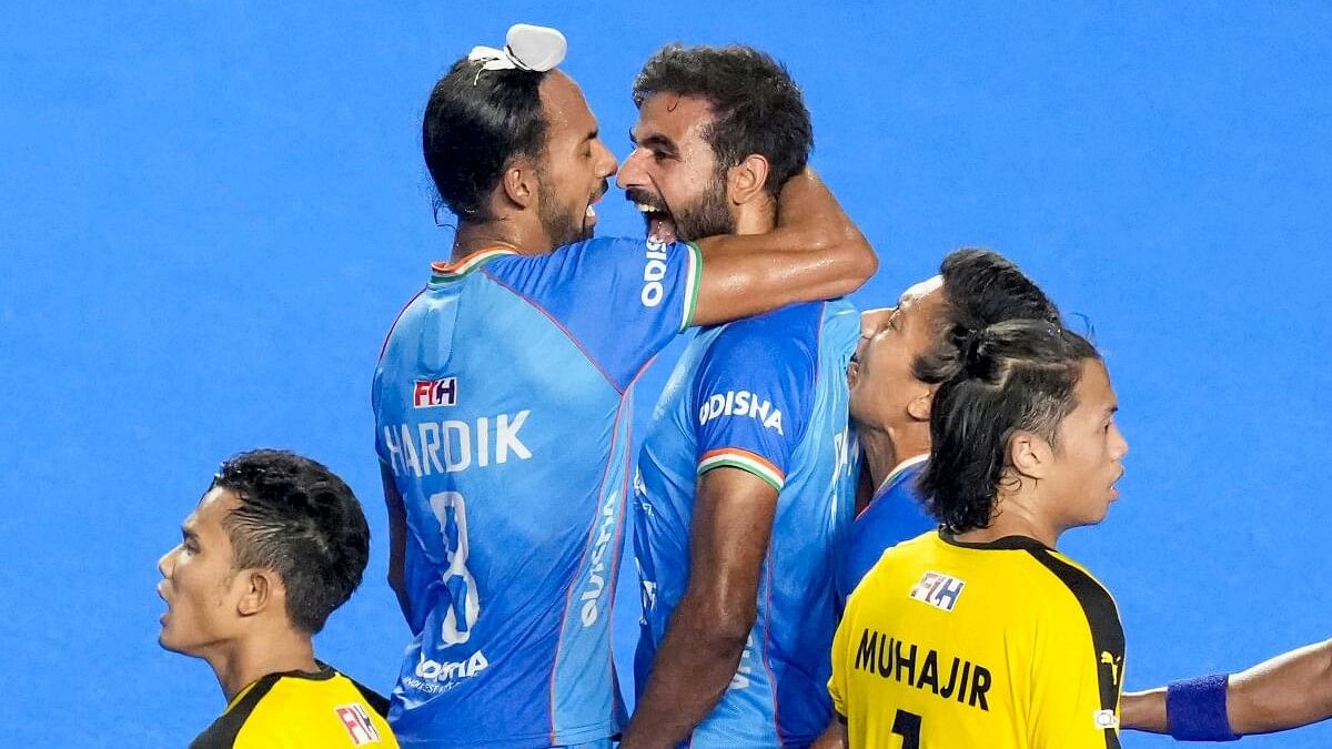 <div class="paragraphs"><p>India's Gurjant Singh celebrates with teammates after scoring a goal during the Asian Champions Trophy 2023 final hockey match between India and Malaysia.</p></div>