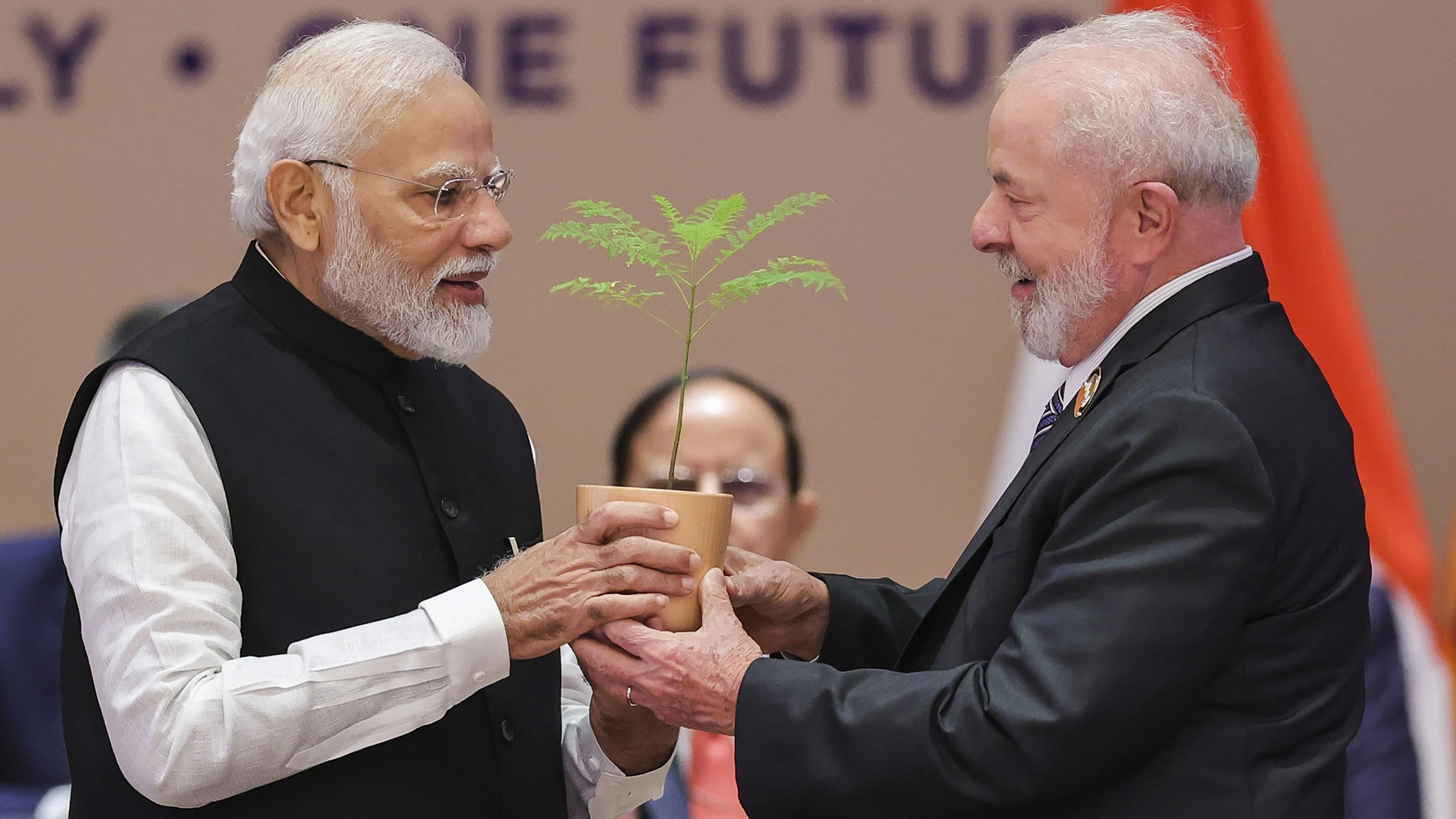 <div class="paragraphs"><p>Prime Minister Narendra Modi with Brazil's President Luiz Inacio Lula da Silva during the symbolic tree plantation ceremony at the closing session of the G20 Summit 2023 at the Bharat Mandapam.</p></div>