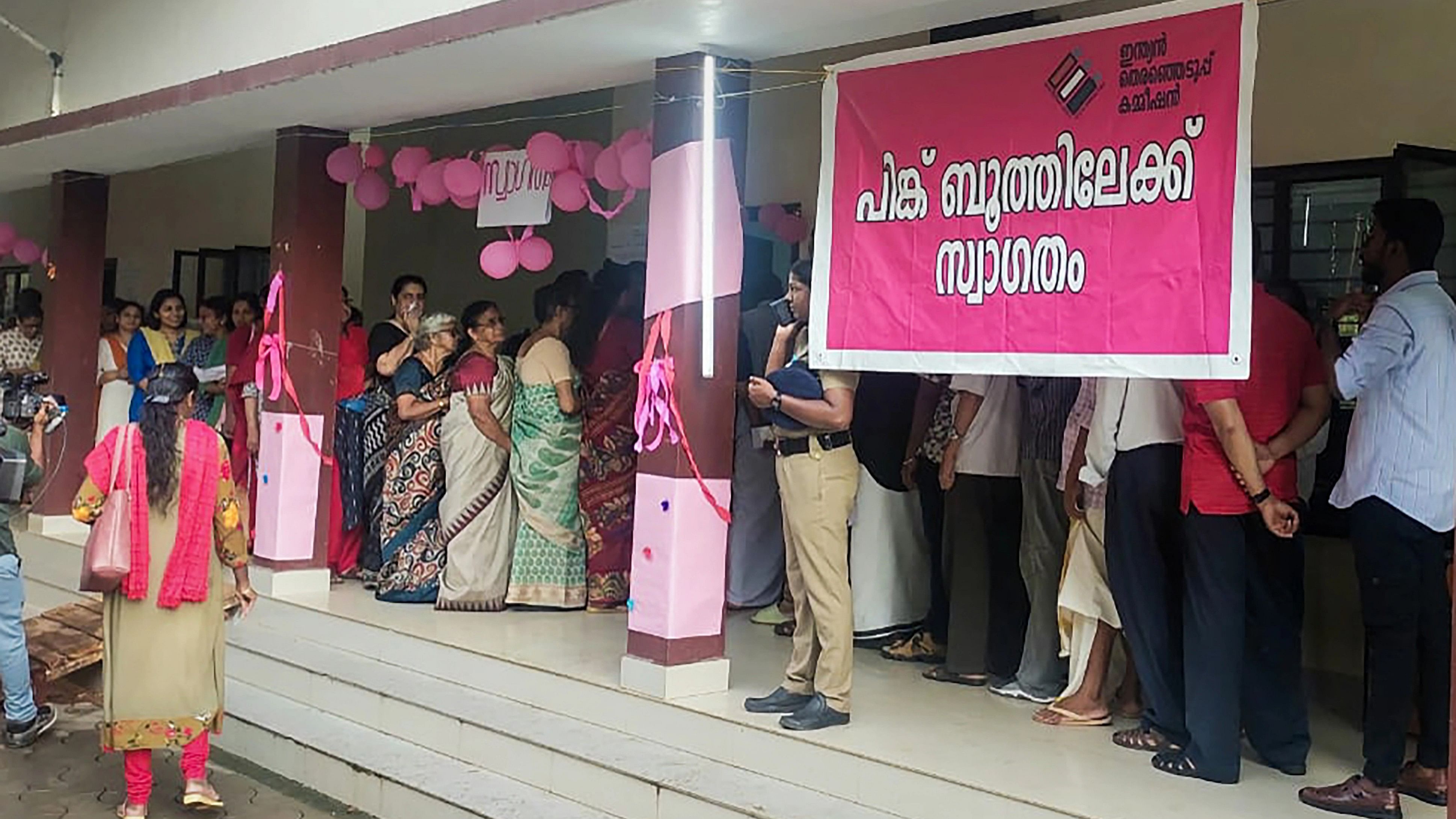 <div class="paragraphs"><p>Voters wait in a queue to cast their votes during the by-elections to Puthuppally assembly seat, in Kerala's Kottayam district.</p></div>