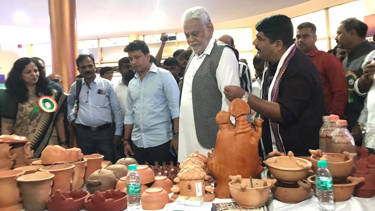 <div class="paragraphs"><p>Rupala having a glance at various products displayed by the artisans during the launch of PM Vishwakarma Yojana at TMA Pai Convention Hall in Mangaluru on Sunday.&nbsp;</p></div>