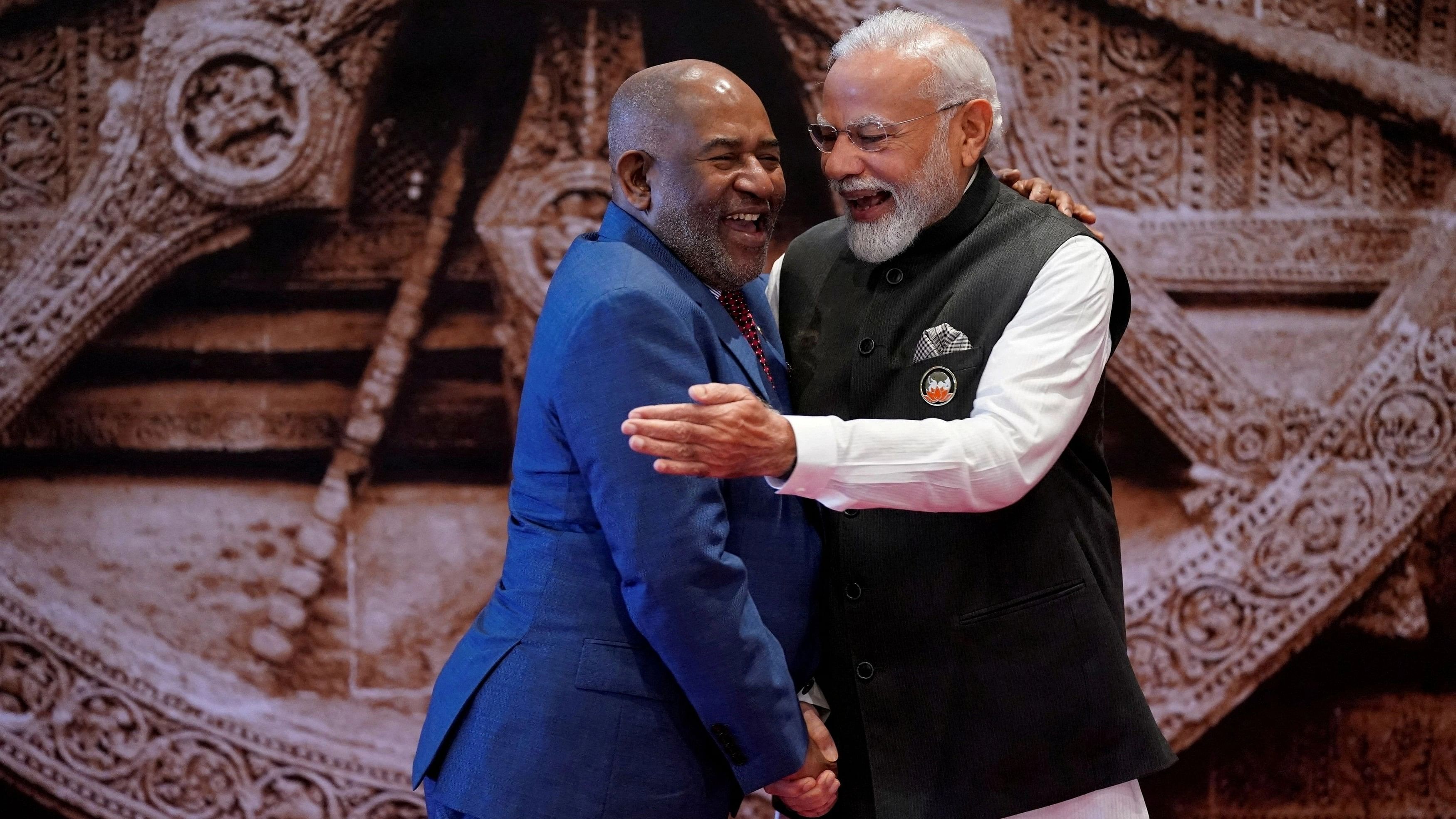 <div class="paragraphs"><p>Prime Minister Narendra Modi shares a light moment with African Union Chairman and President of the Union of the Comoros Azali Assoumani.</p></div>