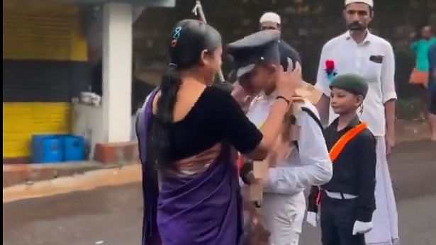 <div class="paragraphs"><p>The video of the heartwarming incident, which went viral, showed the woman waiting patiently in the rain for the rally of marching children and when it arrived, she crossed the street, took out a garland of currency notes, placed it around one of the boys in the procession and also kissed him on the cheek.</p></div>