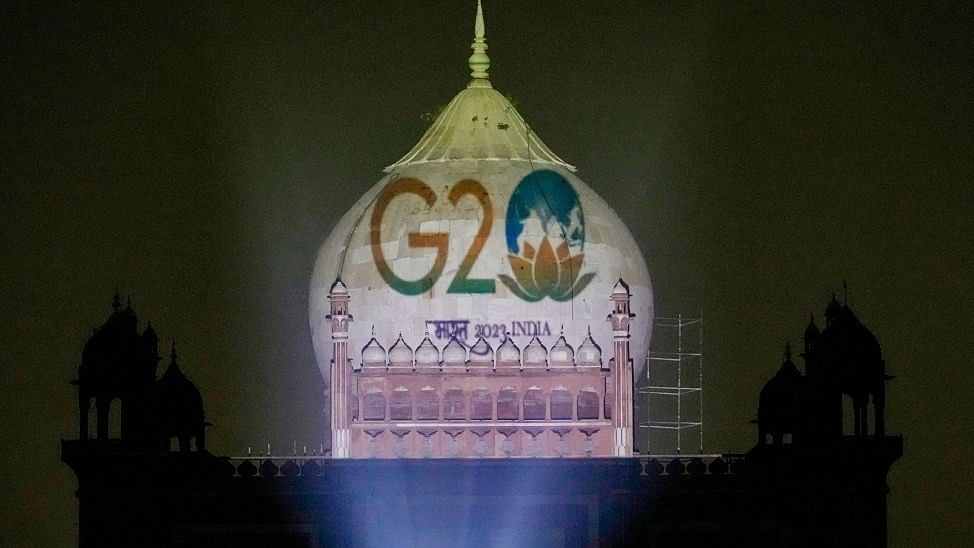 <div class="paragraphs"><p>The Safdarjung Tomb illuminated with the logo of the G20 Summit 2023 in New Delhi. </p></div>