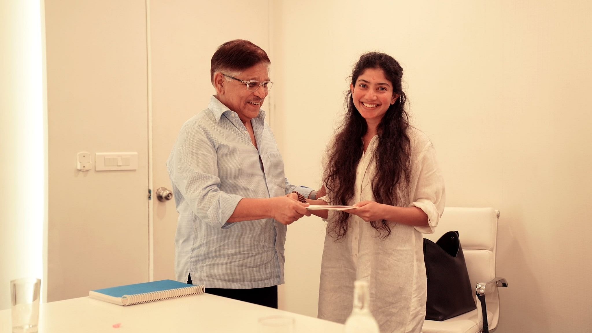 <div class="paragraphs"><p>Sai Pallavi post signing the film.&nbsp;</p></div>