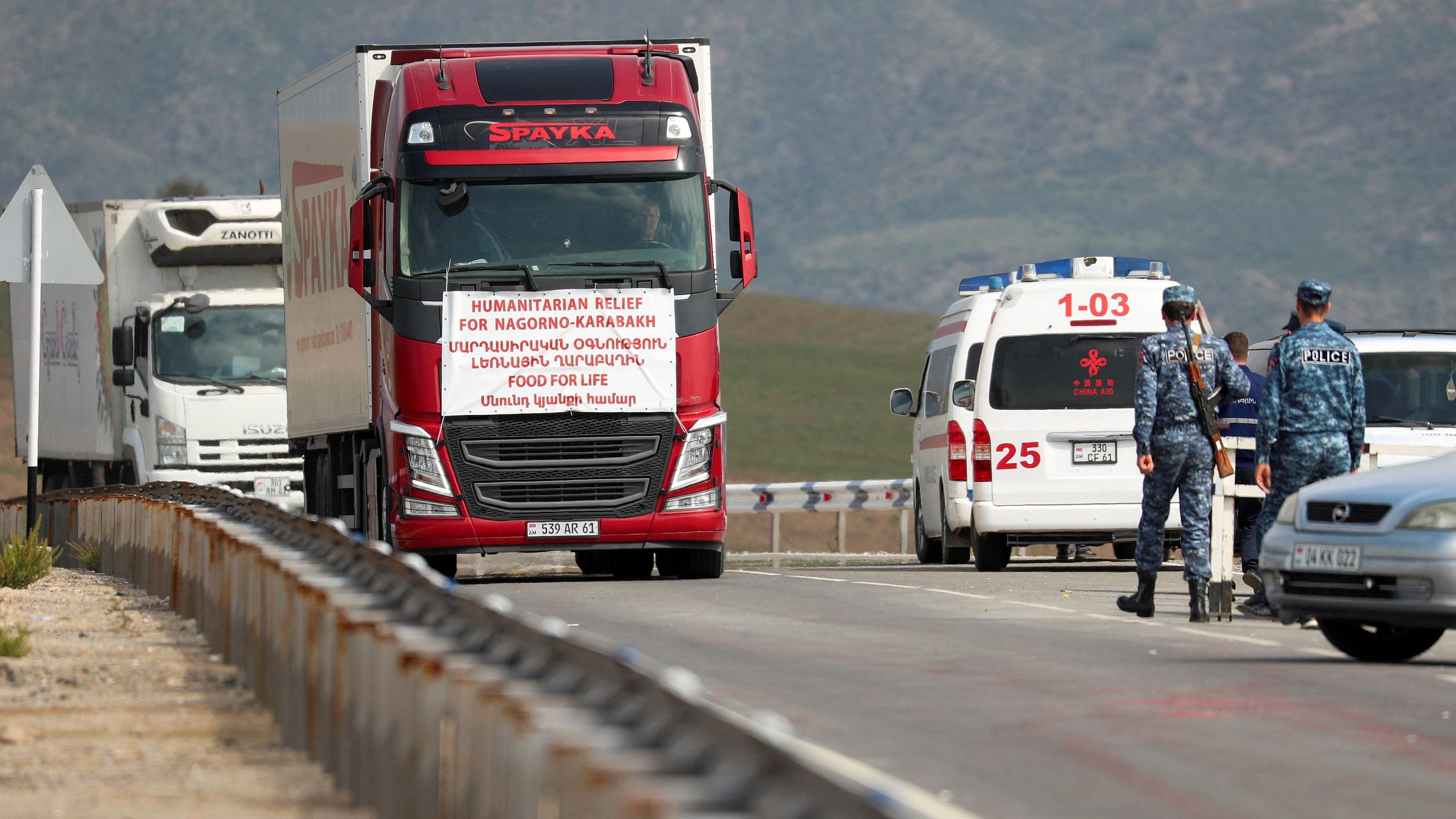 <div class="paragraphs"><p>A truck used for transporting humanitarian aid for residents of Nagorno-Karabakh drives near Kornidzor.&nbsp;</p></div>