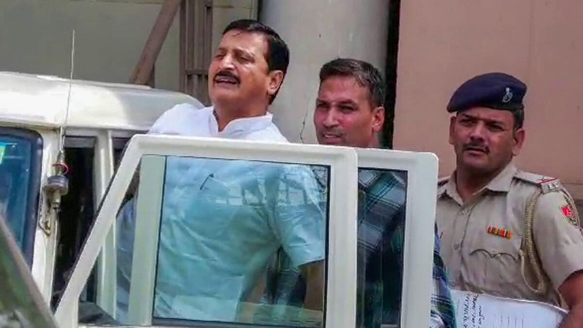 <div class="paragraphs"><p>Congress MLA Mamman Khan being produced before a court in connection with the Nuh violence case, in Nuh district, Tuesday, Sept. 19, 2023.</p></div>