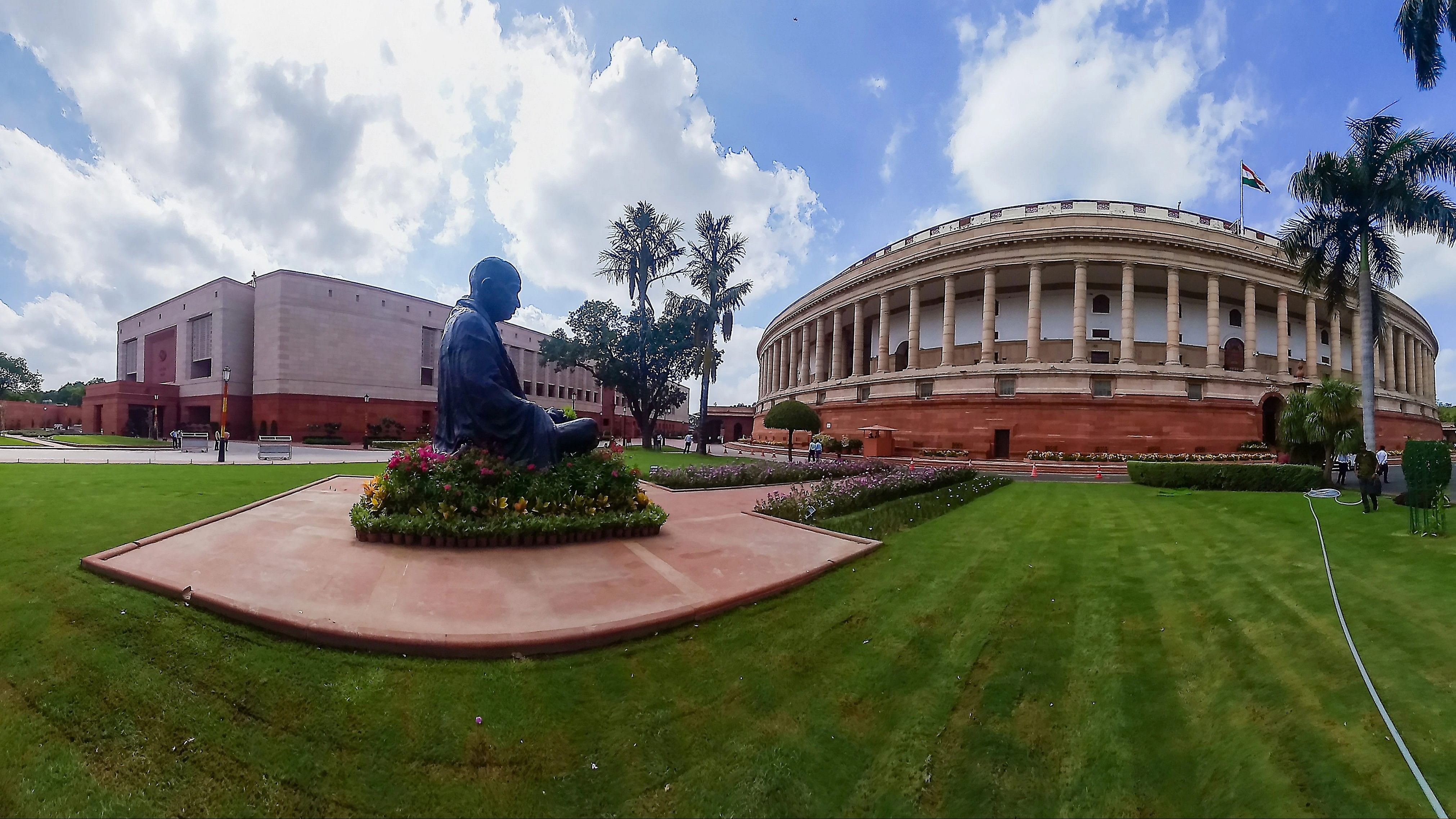 <div class="paragraphs"><p>The existing Parliament building and the new complex (L) on the first day of the special session of Parliament, in New Delhi, Monday, Sept. 18, 2023. </p></div>