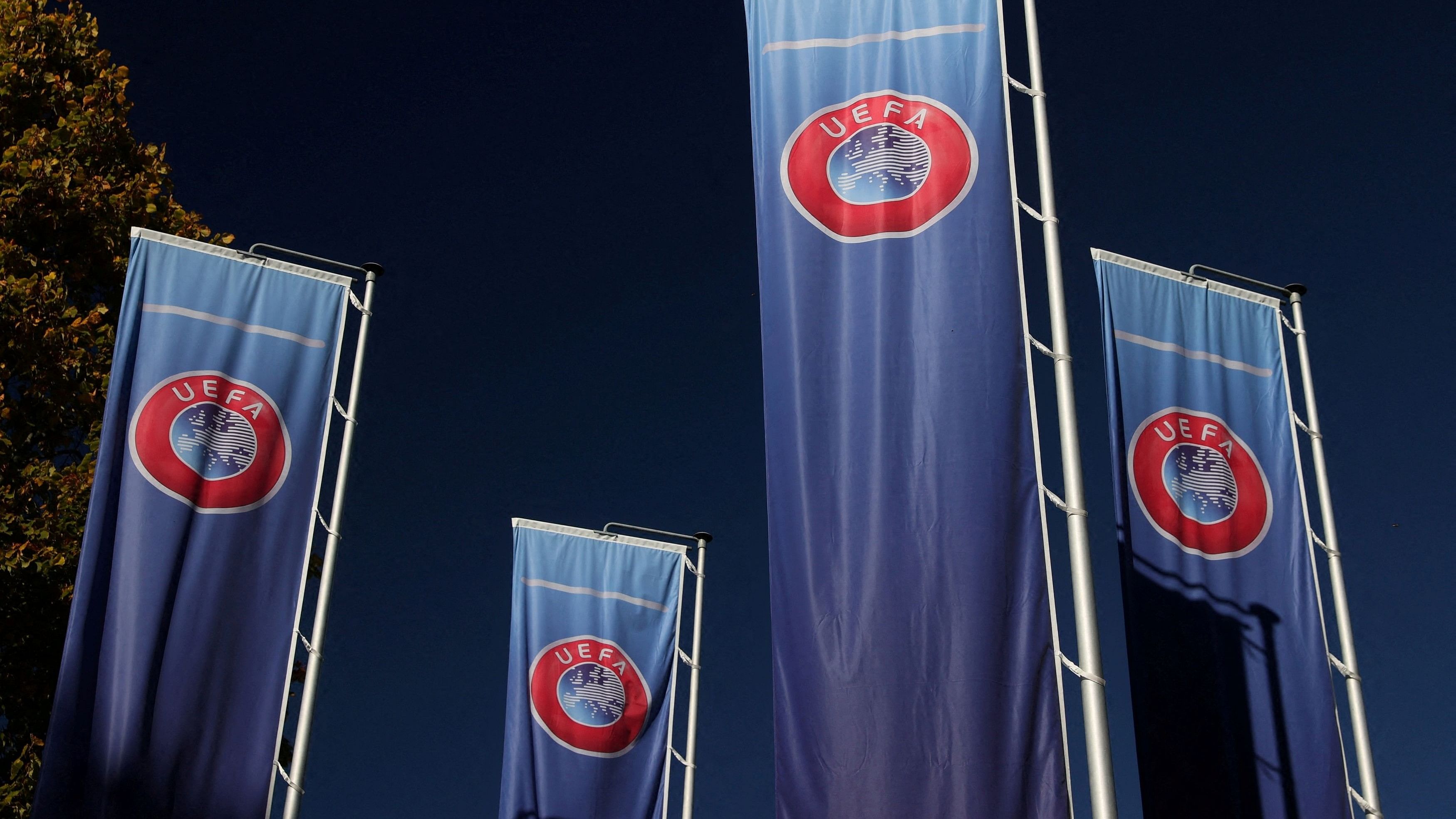 <div class="paragraphs"><p>Flags with UEFA logo.</p></div>