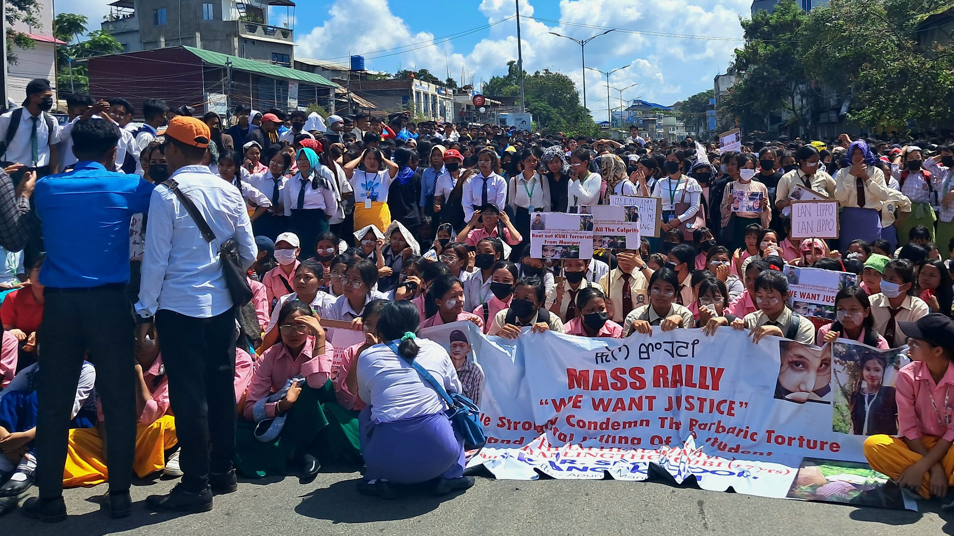 <div class="paragraphs"><p>School students stage a protest rally against the killing of two Meitei youths by suspected Kuki Zo militants, at Moirangkhom in Imphal West district, Wednesday, Sept. 27, 2023.</p></div>