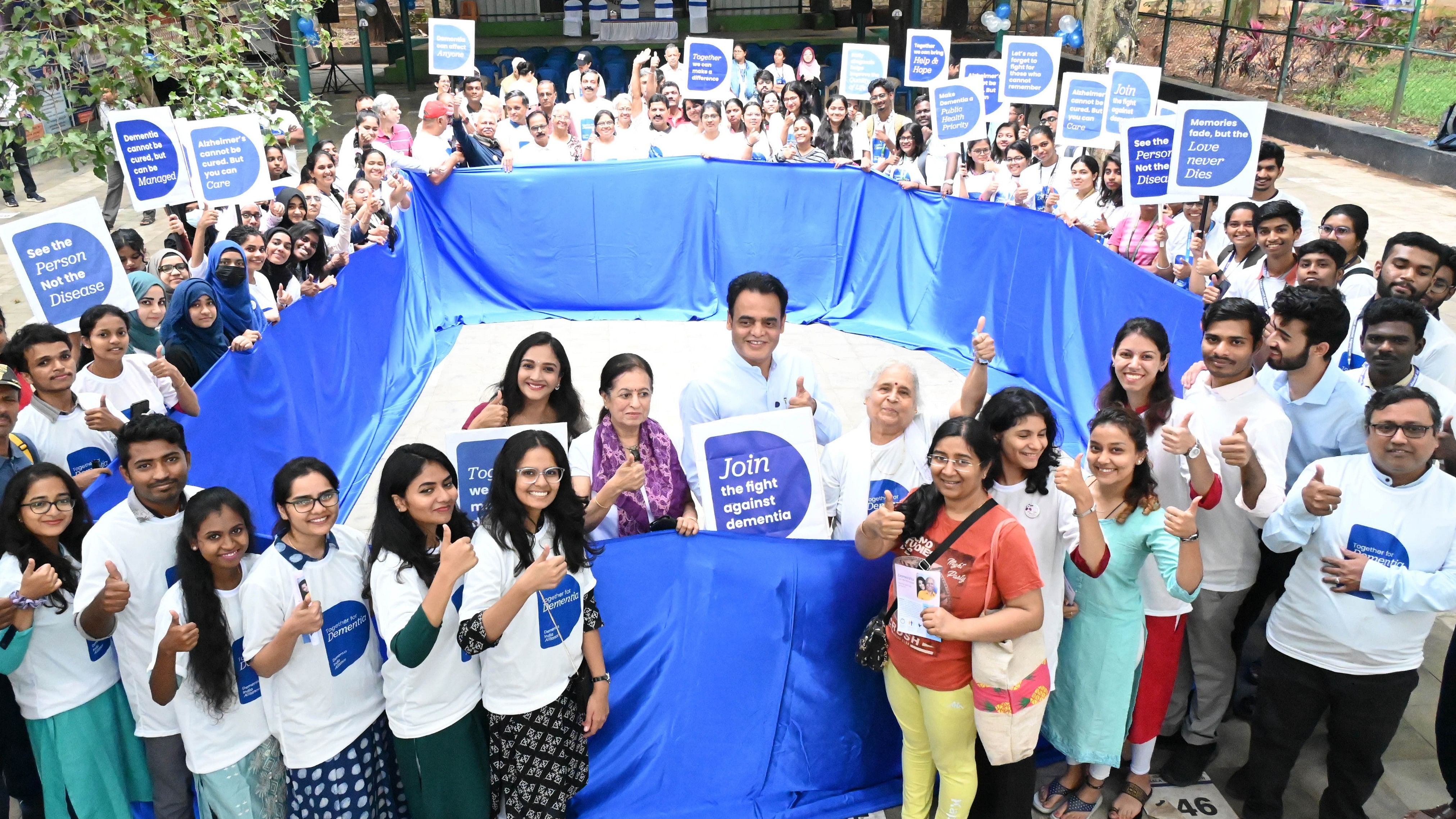 <div class="paragraphs"><p>Malleswaram MLA C N Ashwath Narayan, along with volunteers, gather in a 'D' shape formation during the "Together for Dementia" event, which was held at Sankey Tank on Saturday.&nbsp;</p></div>