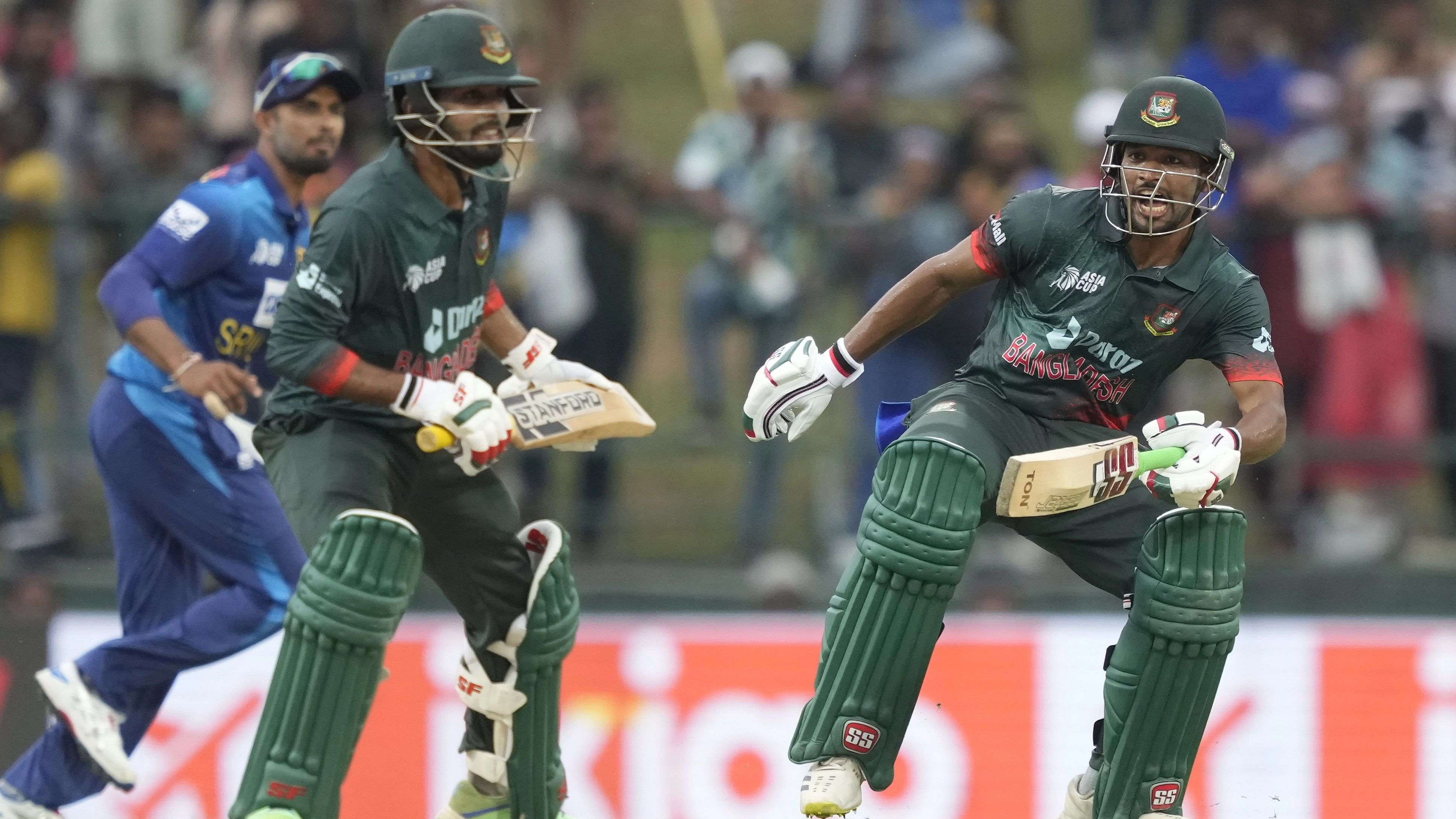 <div class="paragraphs"><p>Bangladesh's Najmul Hossain Shanto and Towhid Hridoy run between wickets during the one-day international cricket match between Sri Lanka and Bangladesh of Asia Cup in Pallekele, Sri Lanka.</p></div>