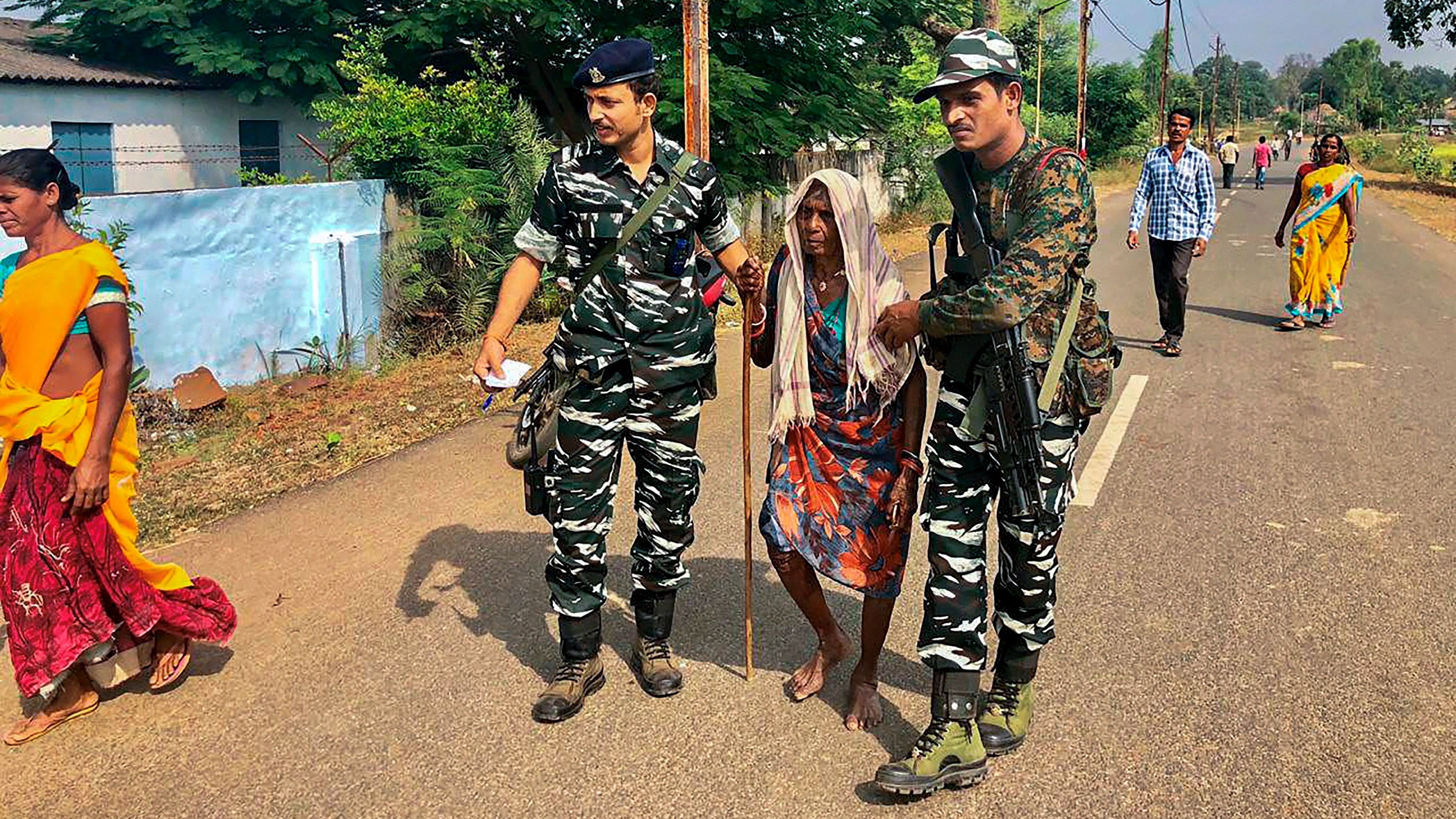 <div class="paragraphs"><p>Security forces assist an elderly person in the Naxal-hit Sukma district.</p></div>