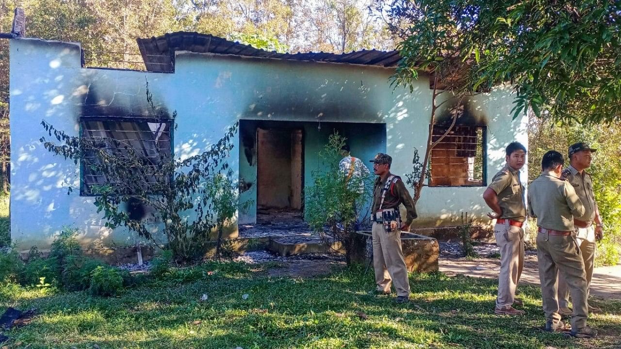 <div class="paragraphs"><p>Security personnel stand guard near a forest office at a disputed Assam-Meghalaya border.</p></div>